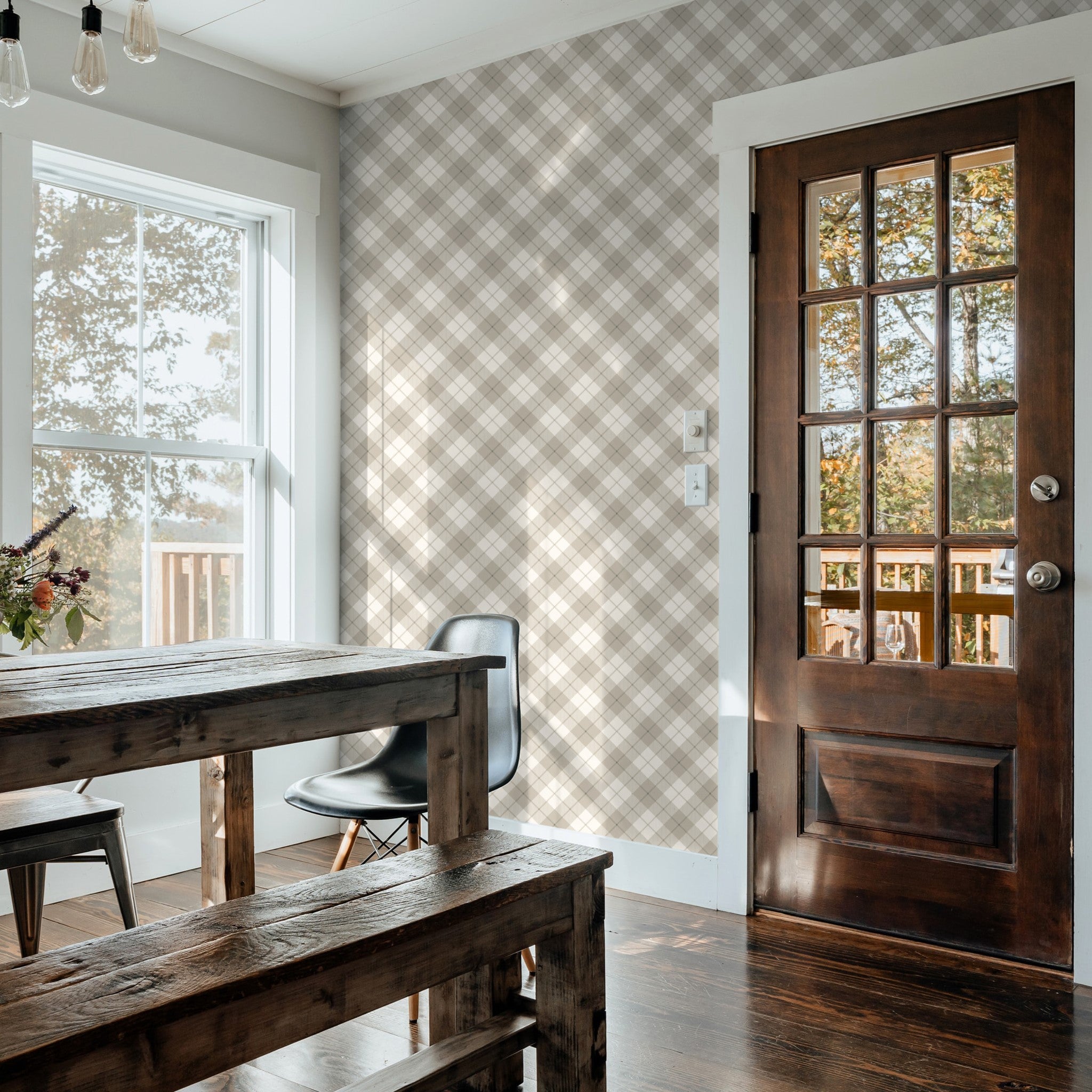 "Wall Blush's Gilmore Wallpaper in a well-lit dining room enhancing rustic decor and wooden furnishings."