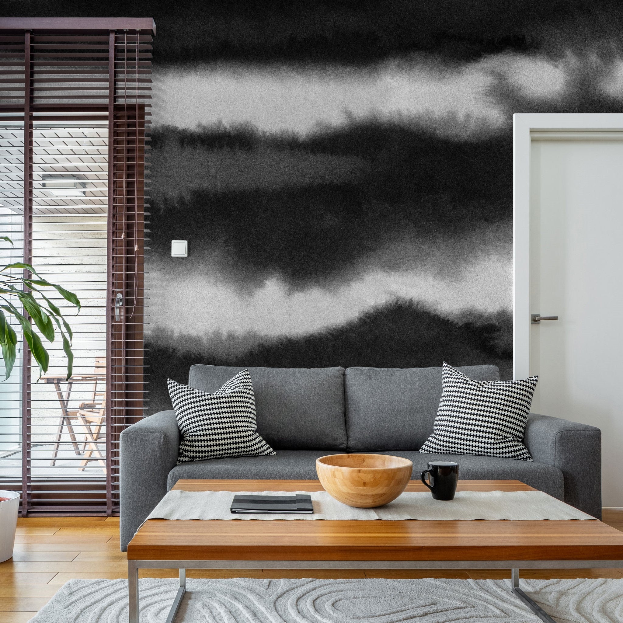 "Modern living room featuring Wall Blush's Power Couple Wallpaper, highlighting elegant black and white design."