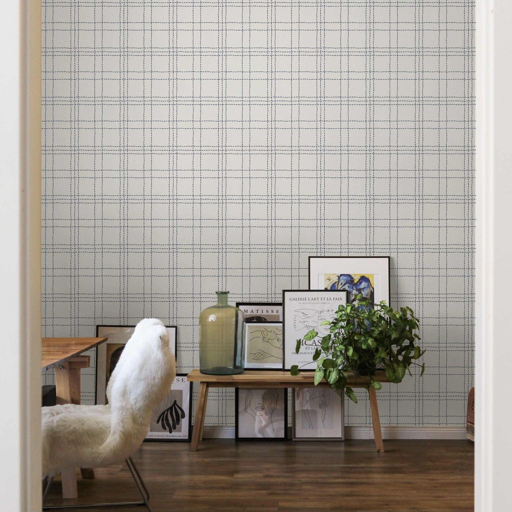 "Wall Blush's Jovie Wallpaper featured in stylish modern home office, highlighting elegant geometric pattern."