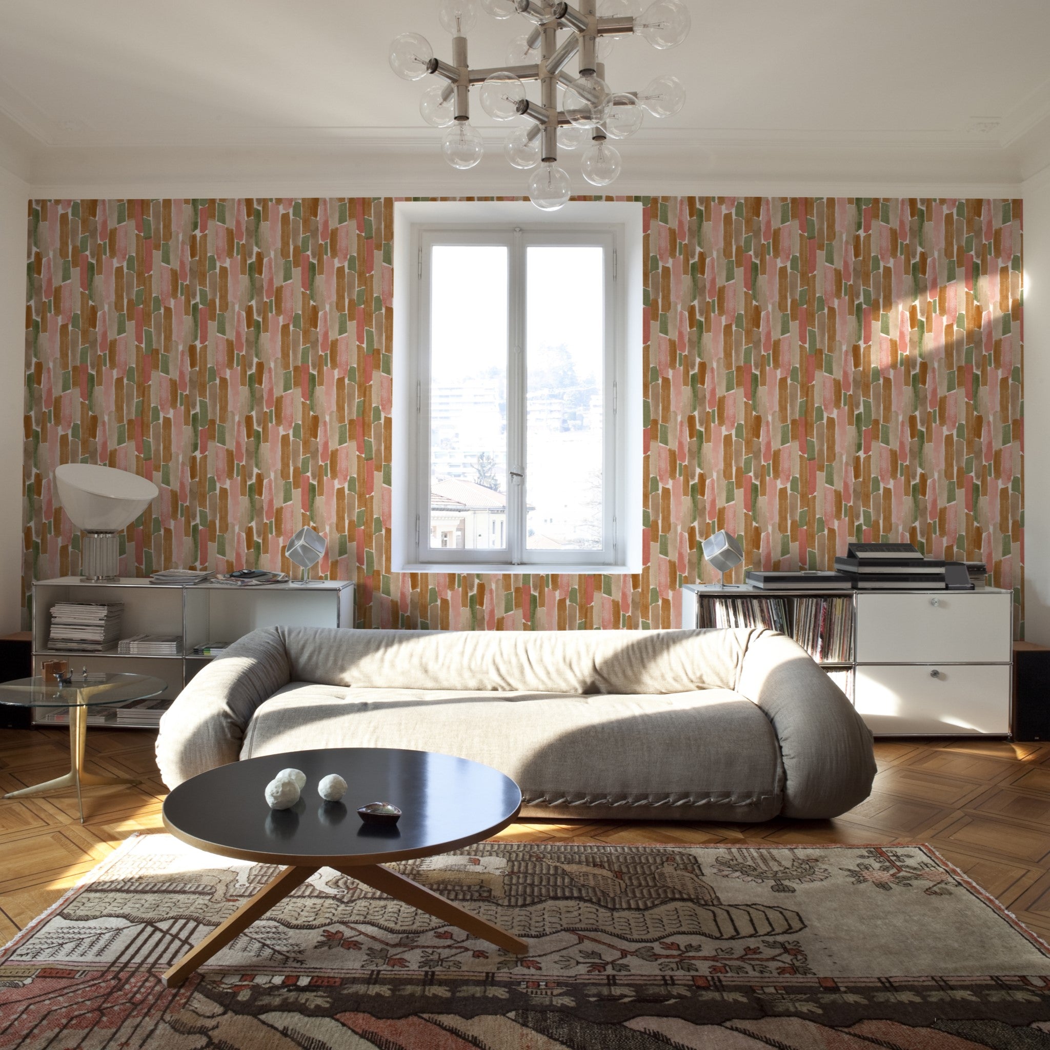 "Hewitt Wallpaper by Wall Blush in a stylish living room, showcasing vibrant patterned decor focus."