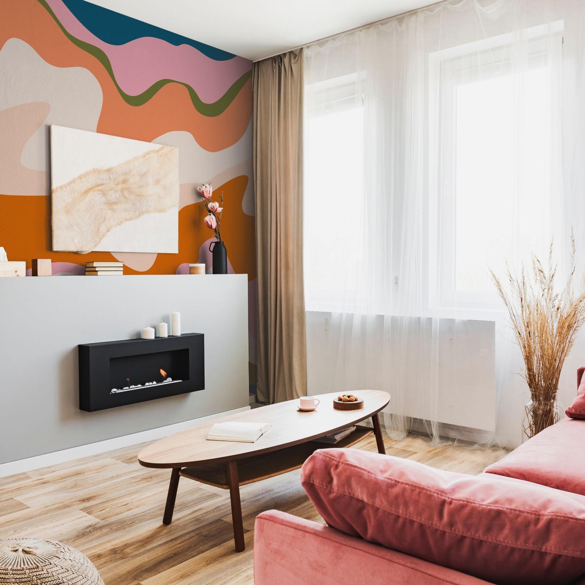 Modern living room showcasing Echo Wallpaper from The Stefanie Bloom Line with vibrant wavy pattern.