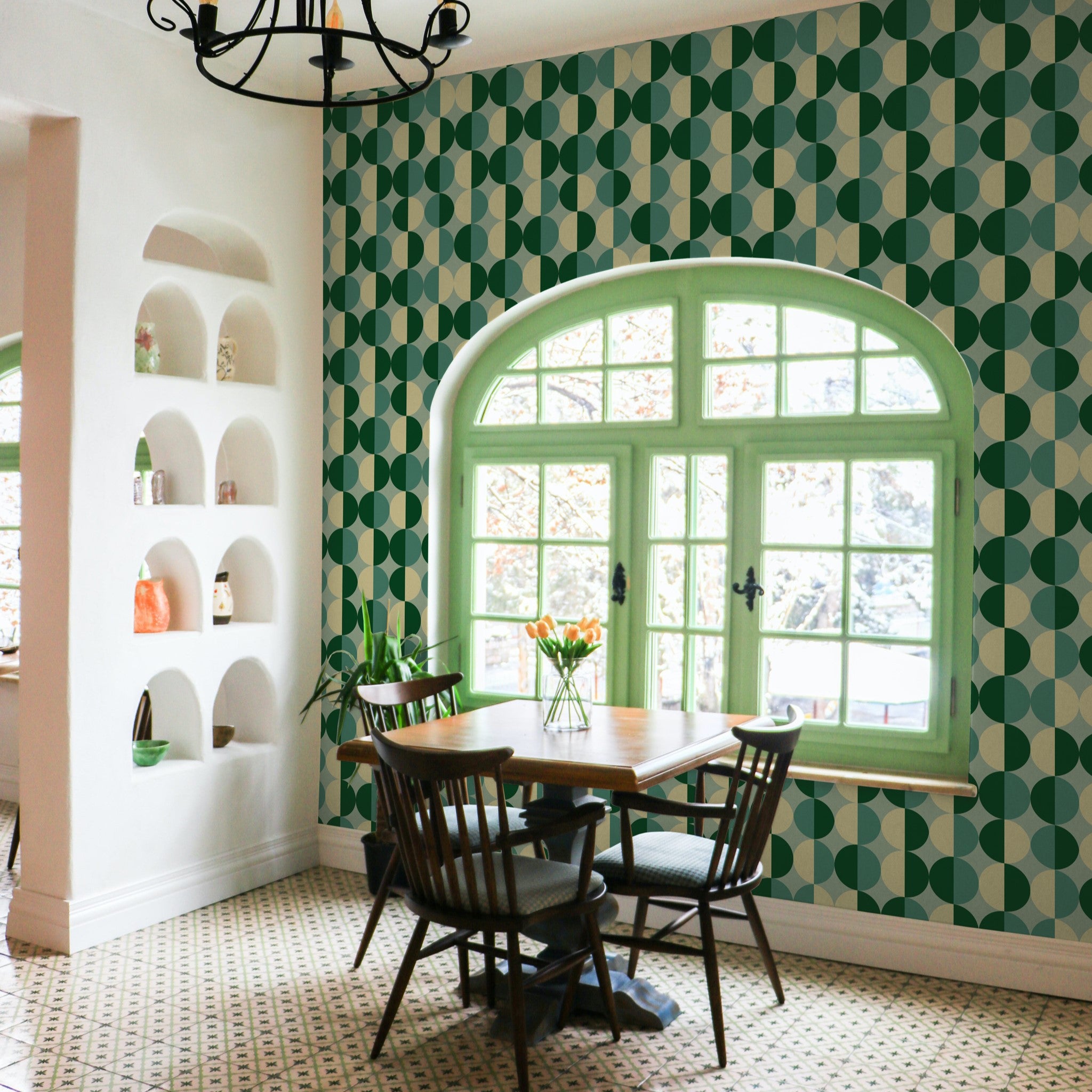 "Chic dining room featuring Wall Blush's Adore You Wallpaper with green geometric patterns highlighting the walls."