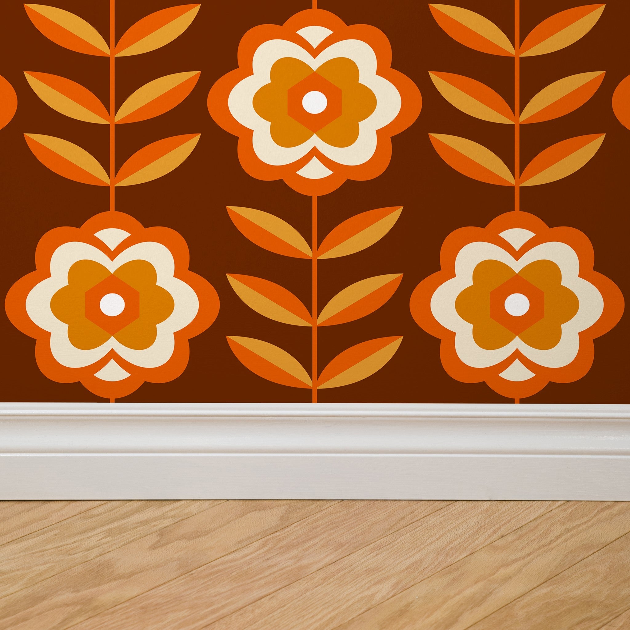 Alt: "Wall Blush Marigold Wallpaper in a modern living room, vibrant orange floral pattern focus."