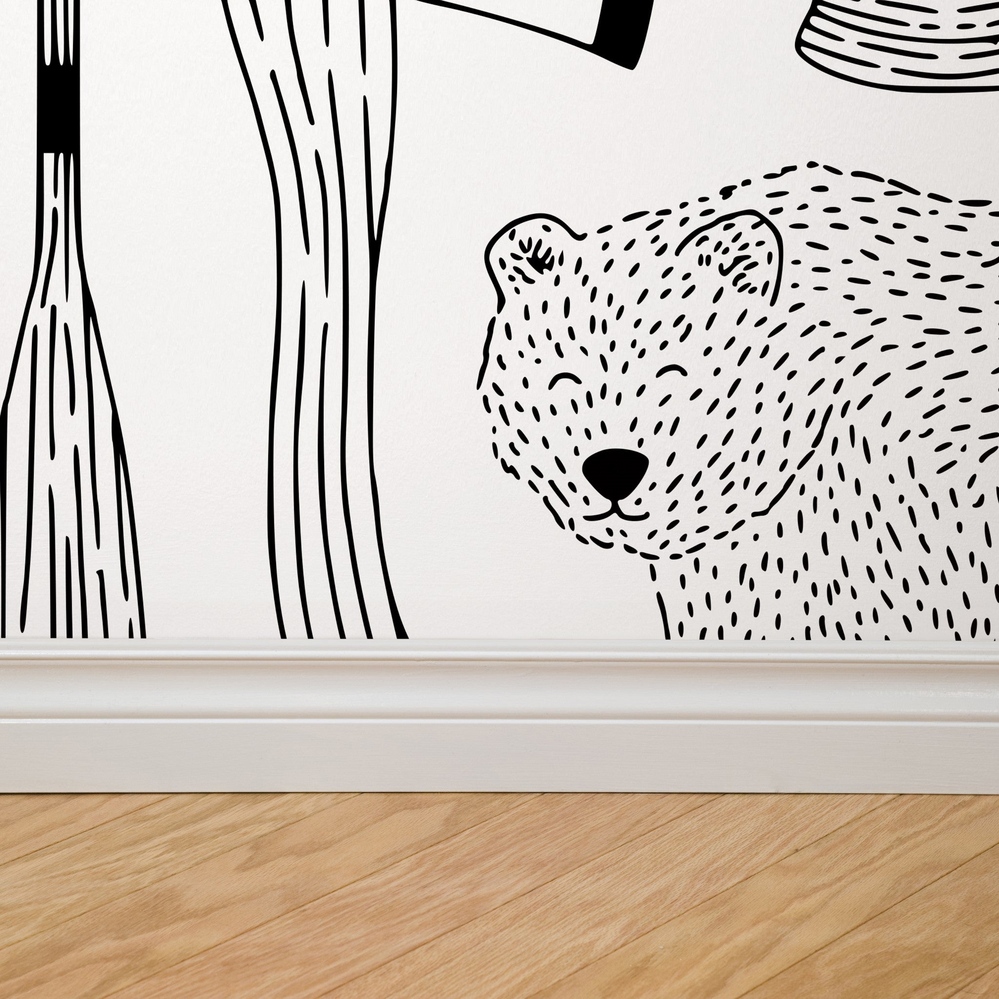"Wall Blush's Trail Blazer Wallpaper featuring bear design in modern home interior, focus on stylish wall decor."