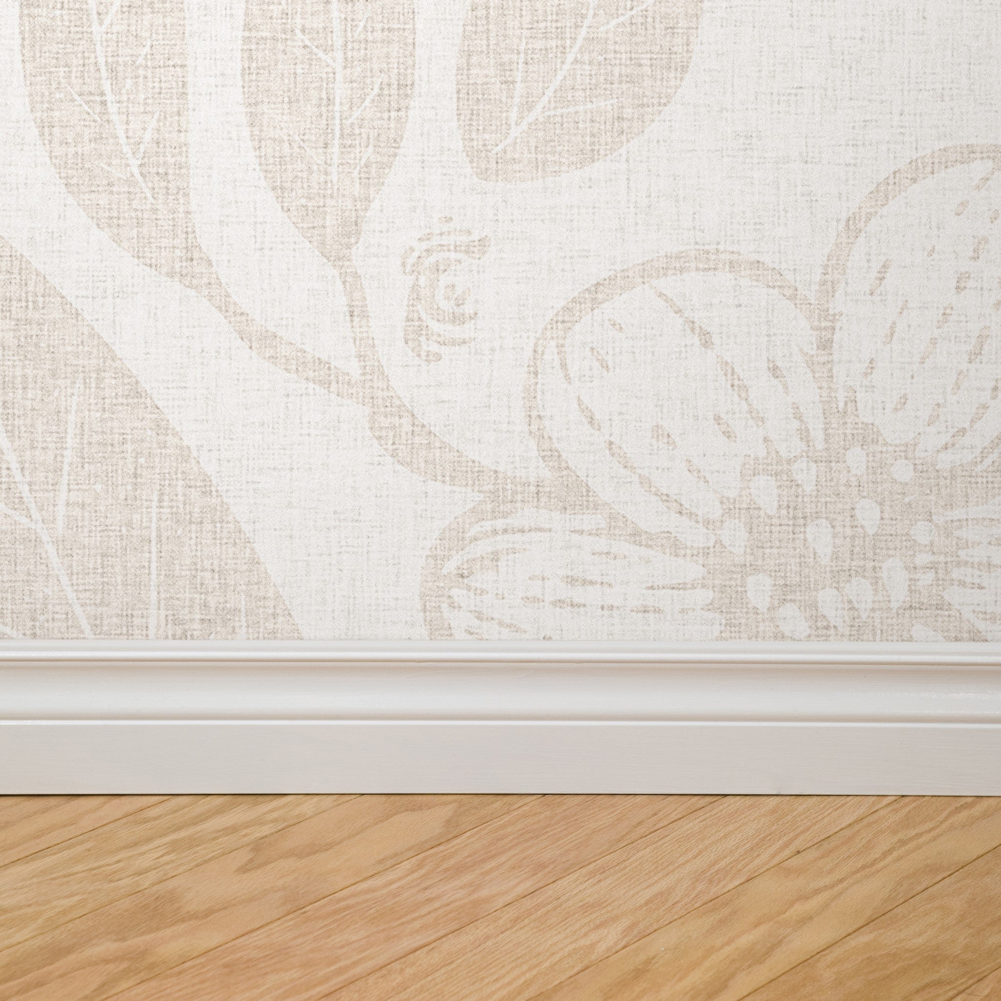 "Dulcia Wallpaper by Wall Blush with elegant patterns installed in a modern living room. Focus on wallpaper texture and design."