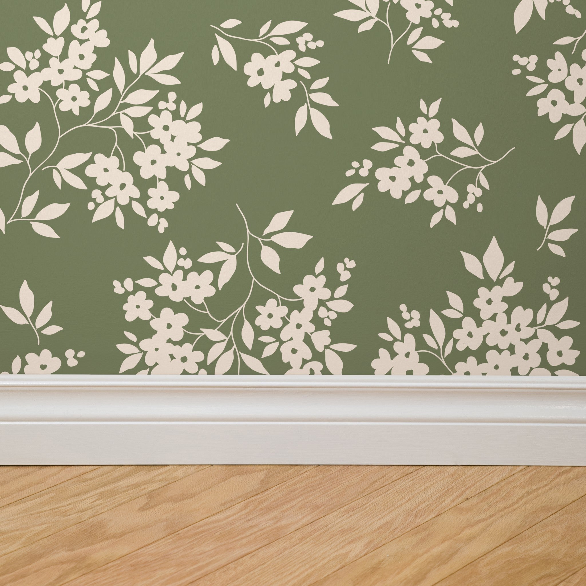 "Kingston Wallpaper by Wall Blush with floral design in modern living room, hardwood floor, serene ambiance."