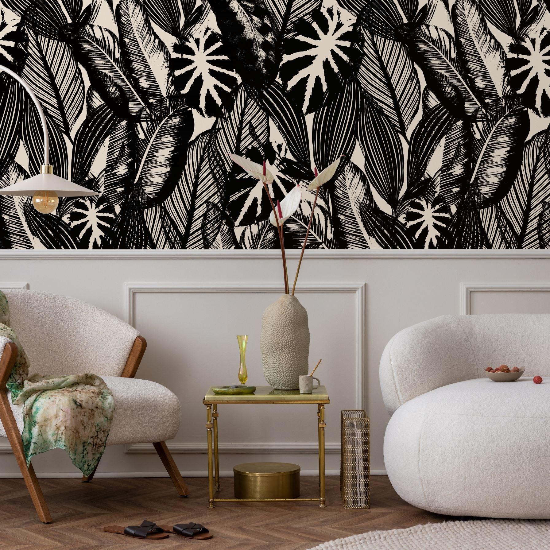 Chloe Wallpaper from The Stefanie Bloom Line enhancing a modern living room's ambiance with a bold tropical pattern.
