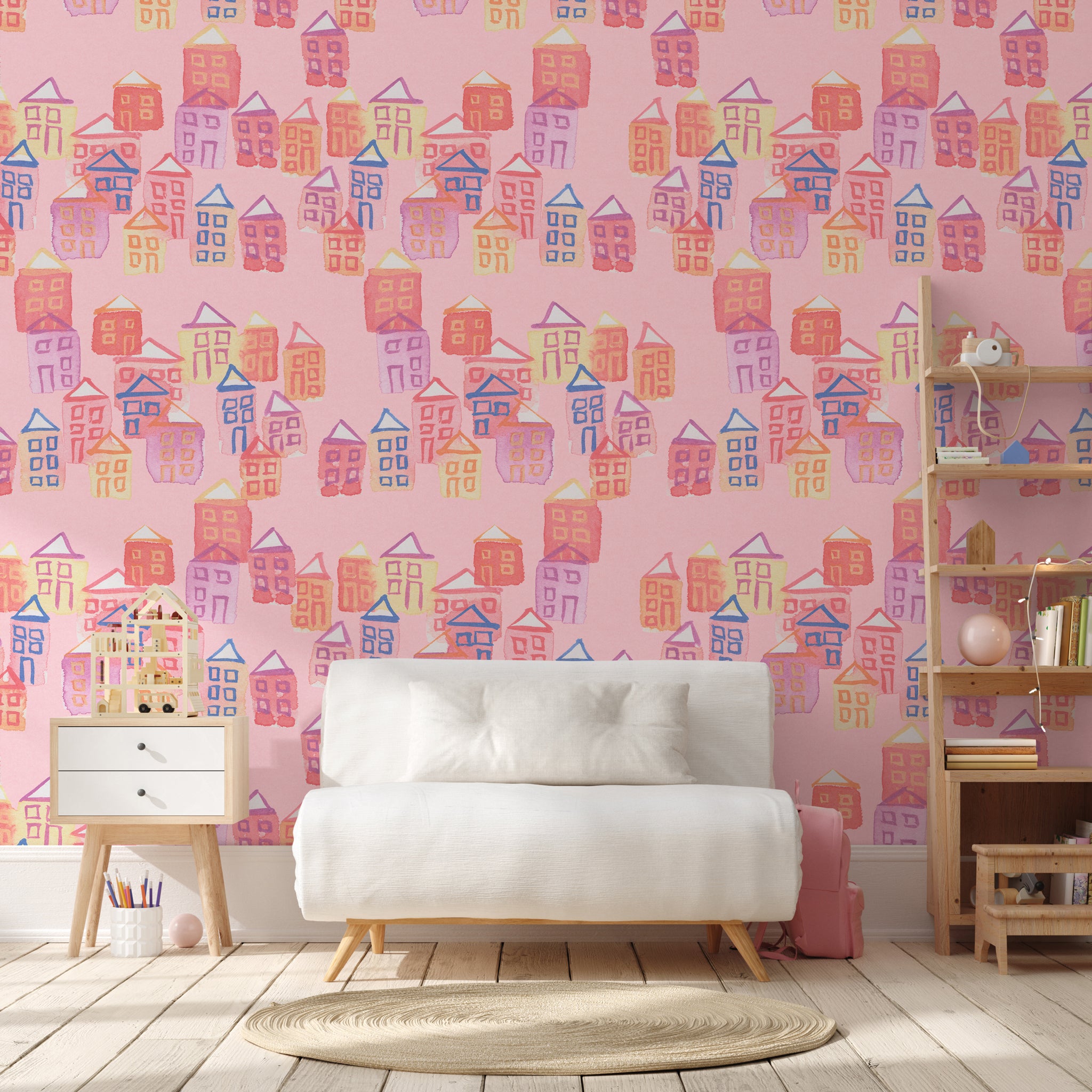 "Dream House Wallpaper by Wall Blush in a cozy children's room with a playful pink pattern."