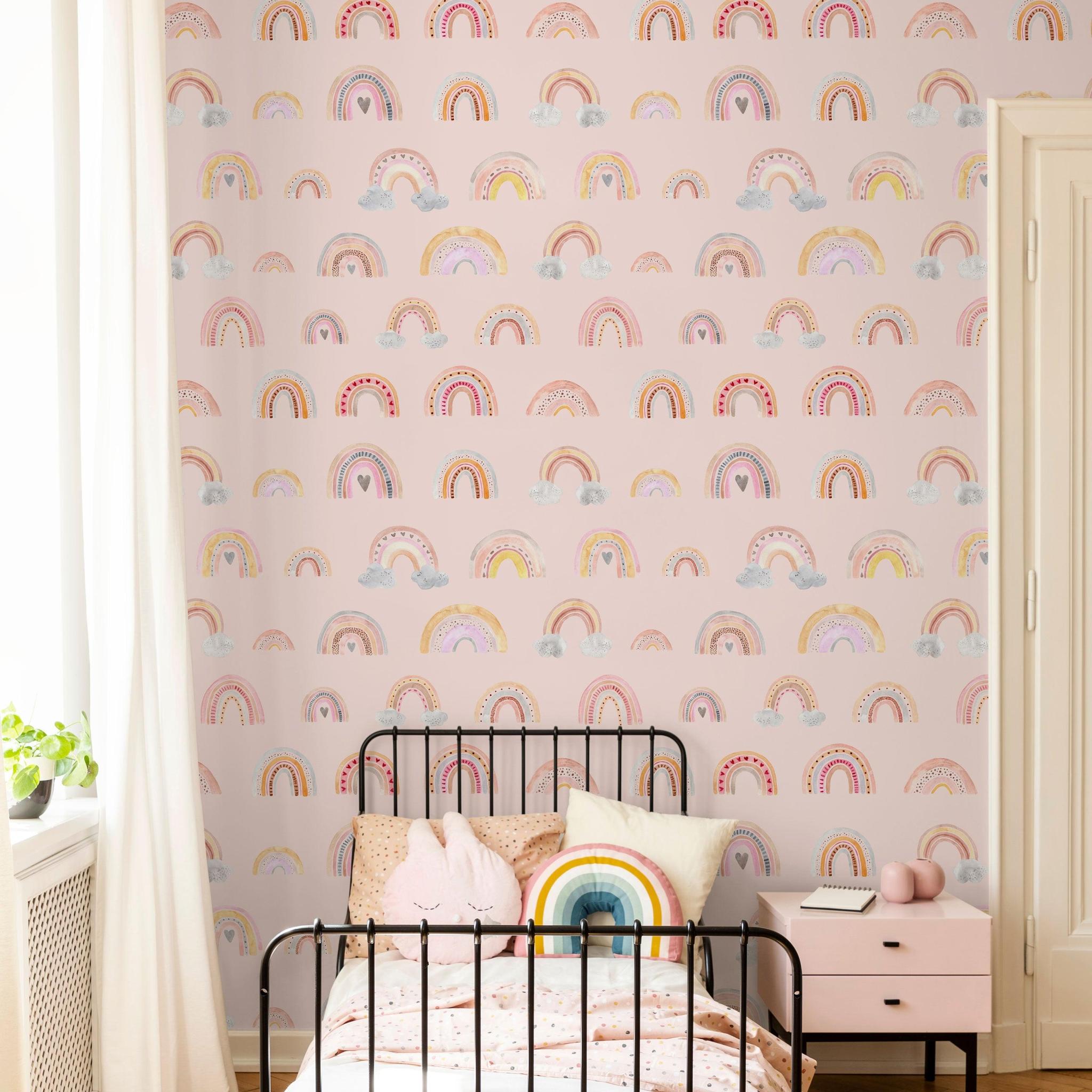 Eden's Rainbows Wallpaper by Wall Blush in a stylish child's bedroom, highlighting the colorful wall decor.
