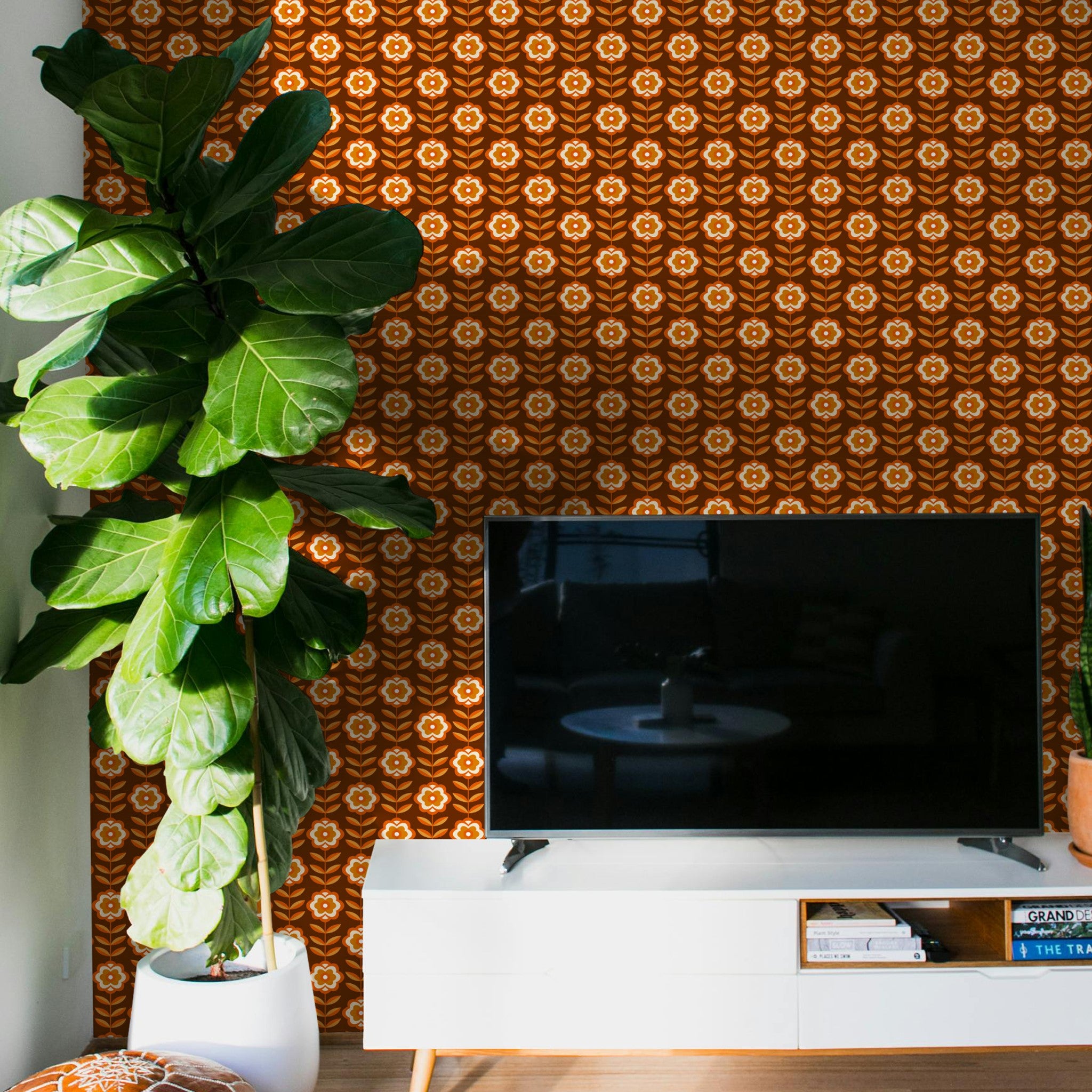 "Wall Blush Marigold Wallpaper accenting a modern living room interior with vibrant, decorative pattern"