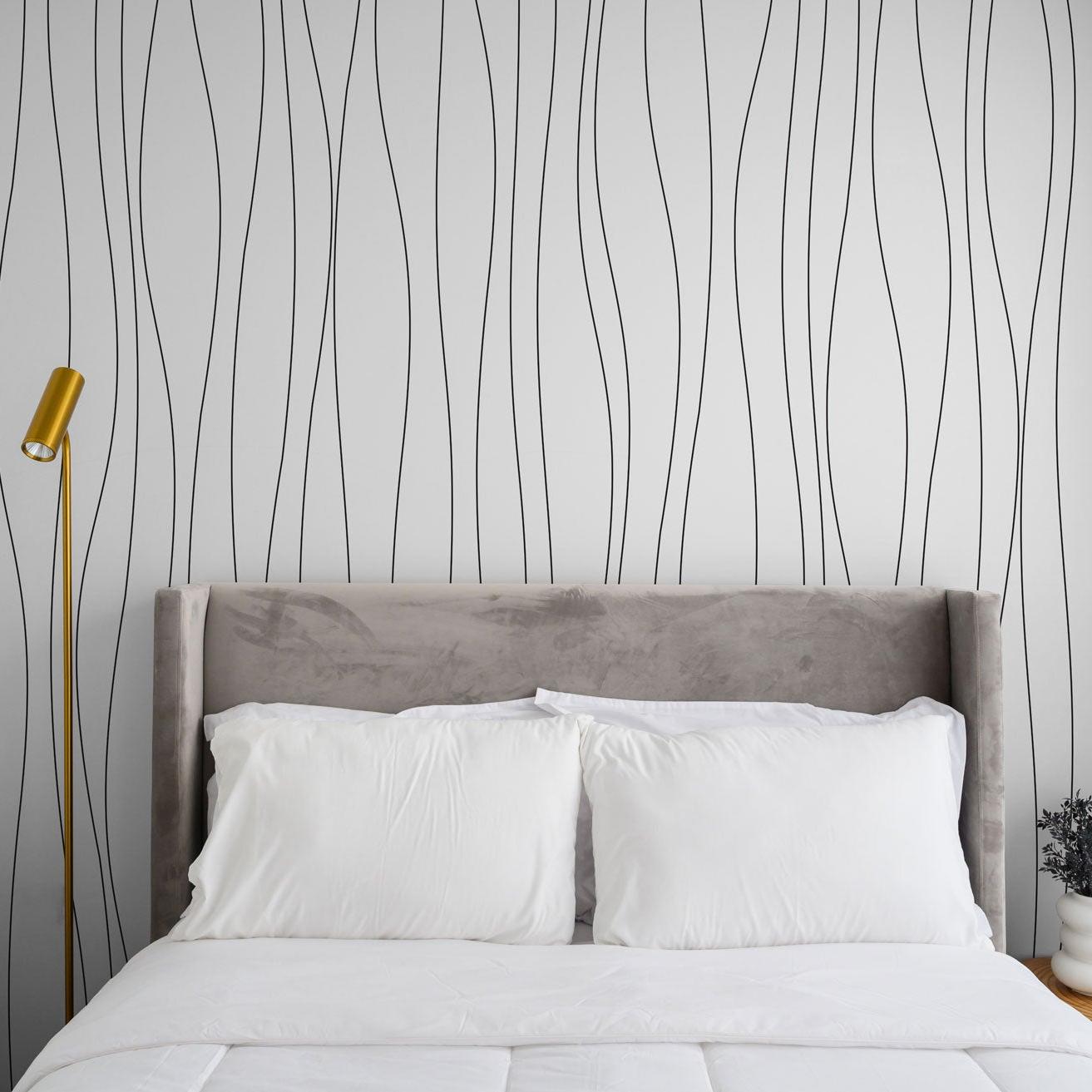 Wall Blush's High Glades Wallpaper featured in a modern bedroom interior, with elegant design focus.