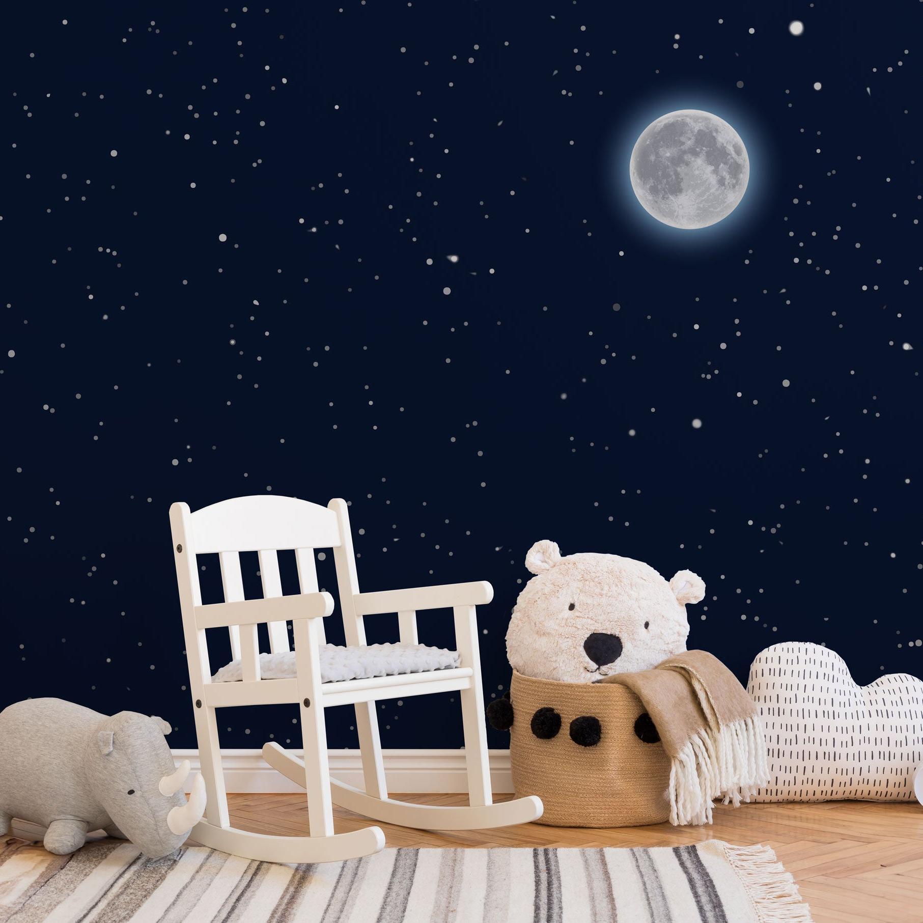 Wall Blush Moonlight Wallpaper in cozy nursery room with starry night theme and modern decor.