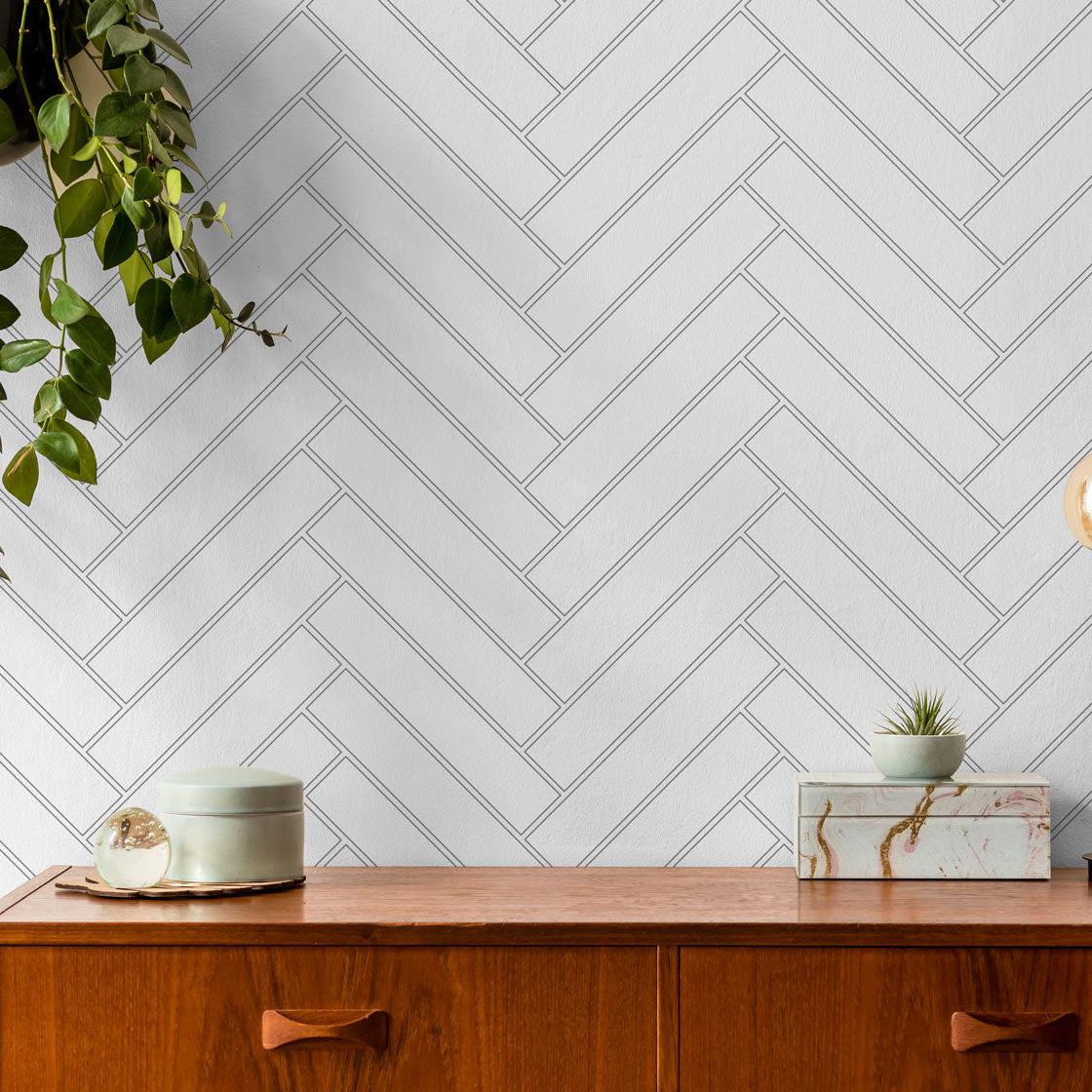 Stitch Wallpaper by Wall Blush in a modern room, with herringbone pattern focus on wall decor.
