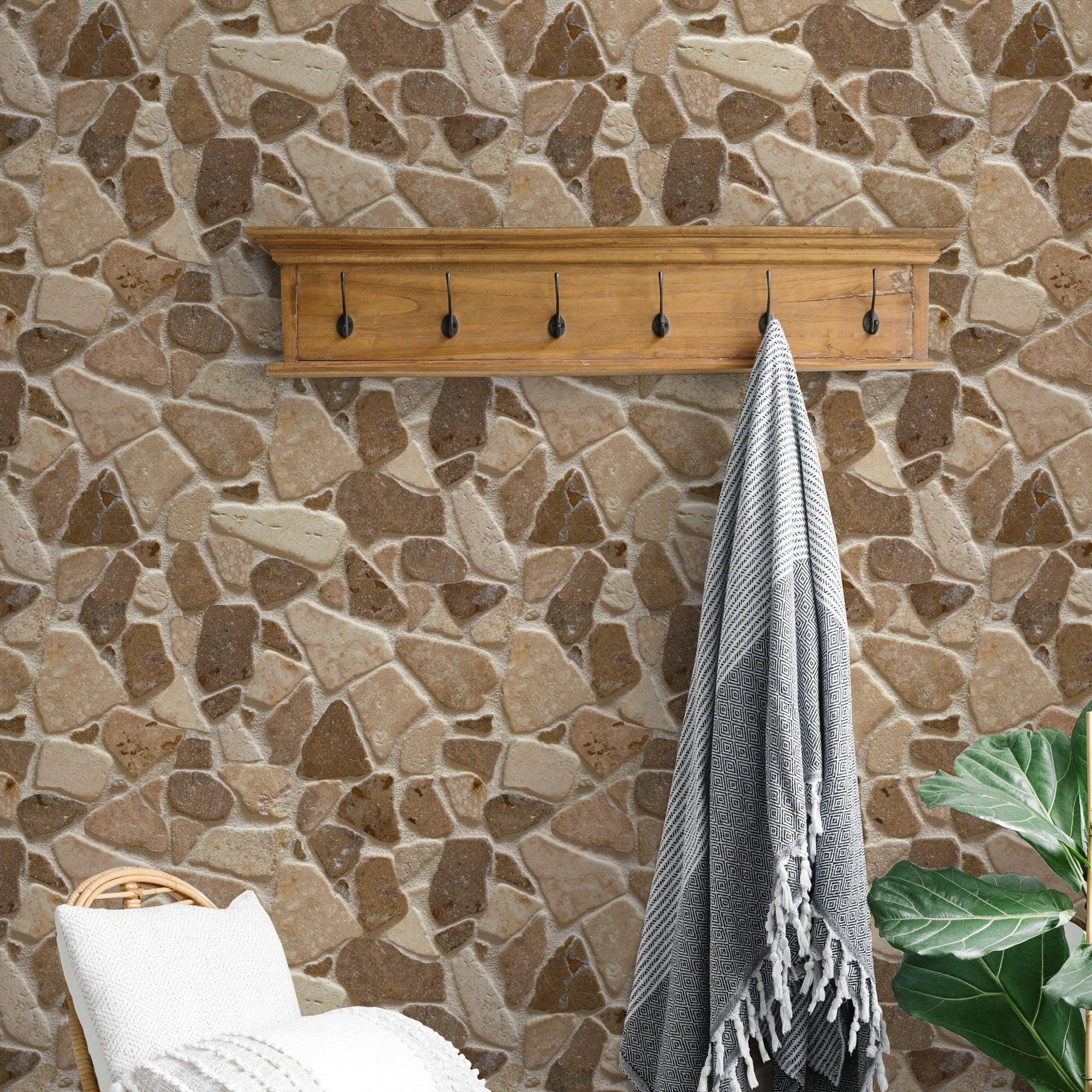 Wall Blush AW01's The Abbey Wallpaper featured in a cozy room with a wicker chair and stone pattern focus.