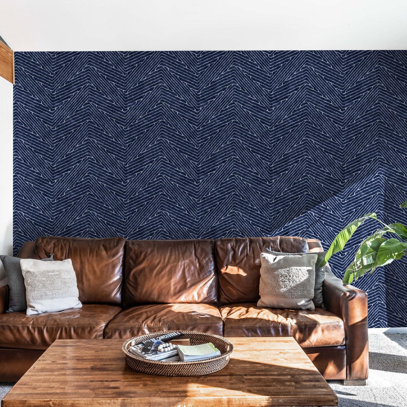 Windsor Wallpaper from Wall Blush SG02 in a cozy living room with stylish brown leather sofa.
