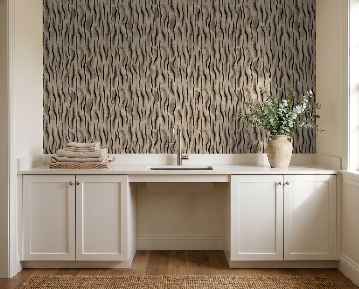 Abstract wavy taupe and charcoal wallpaper in modern kitchen setting.