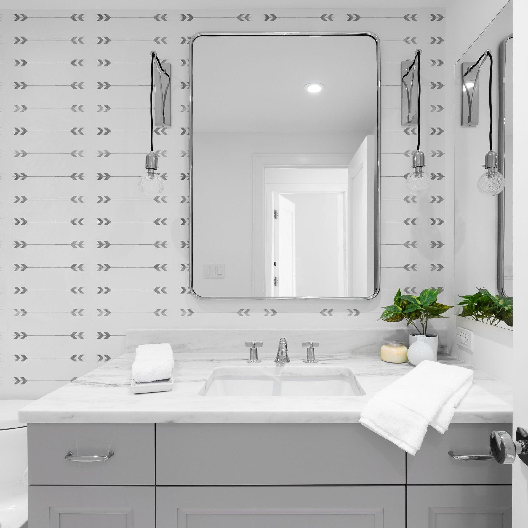 Modern bathroom featuring Archer Wallpaper by The Chelsea DeBoer Line, highlighting elegant wall design.