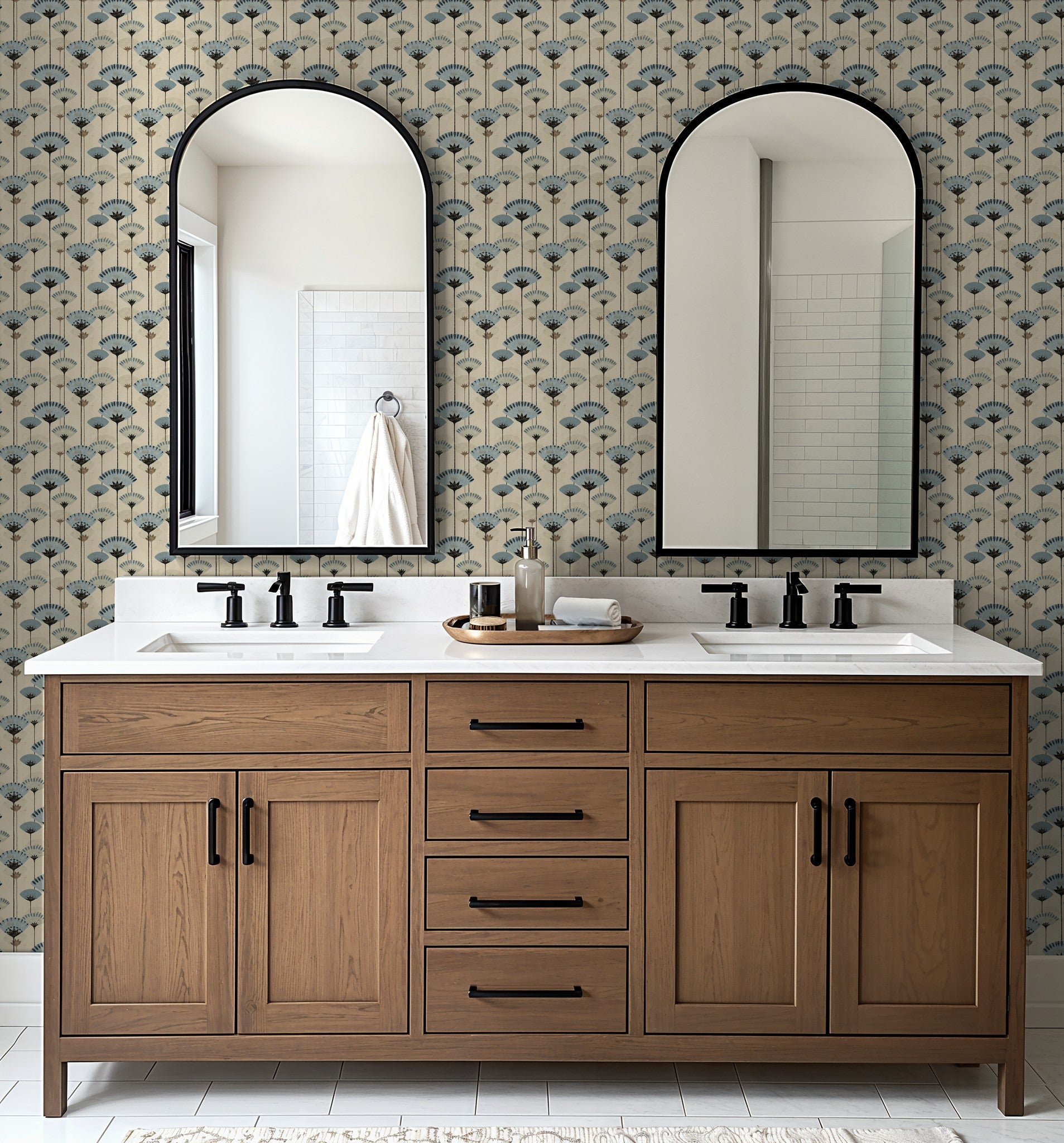 Bathroom with beige floral wallpaper, wood vanity, and double mirrors.
