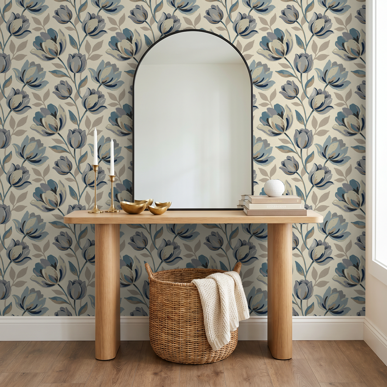 Elegant floral wallpaper with blue and gray blooms in a modern entryway with mirror and wooden table.