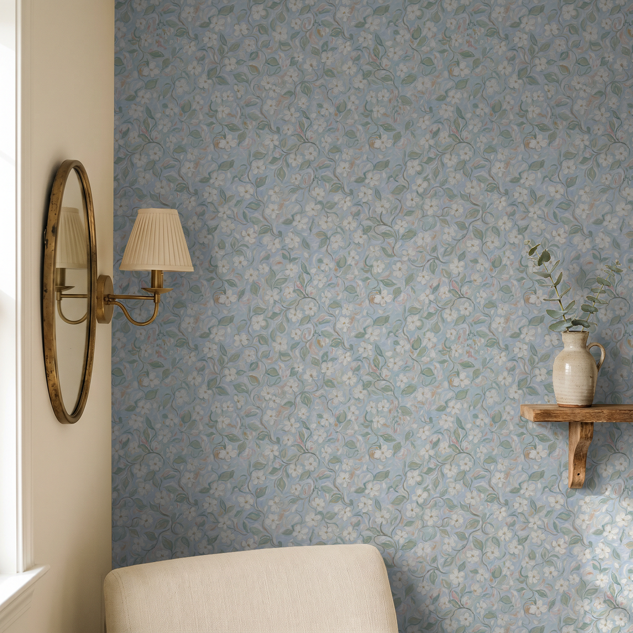 Blue floral wallpaper with white flowers in cozy living room setting