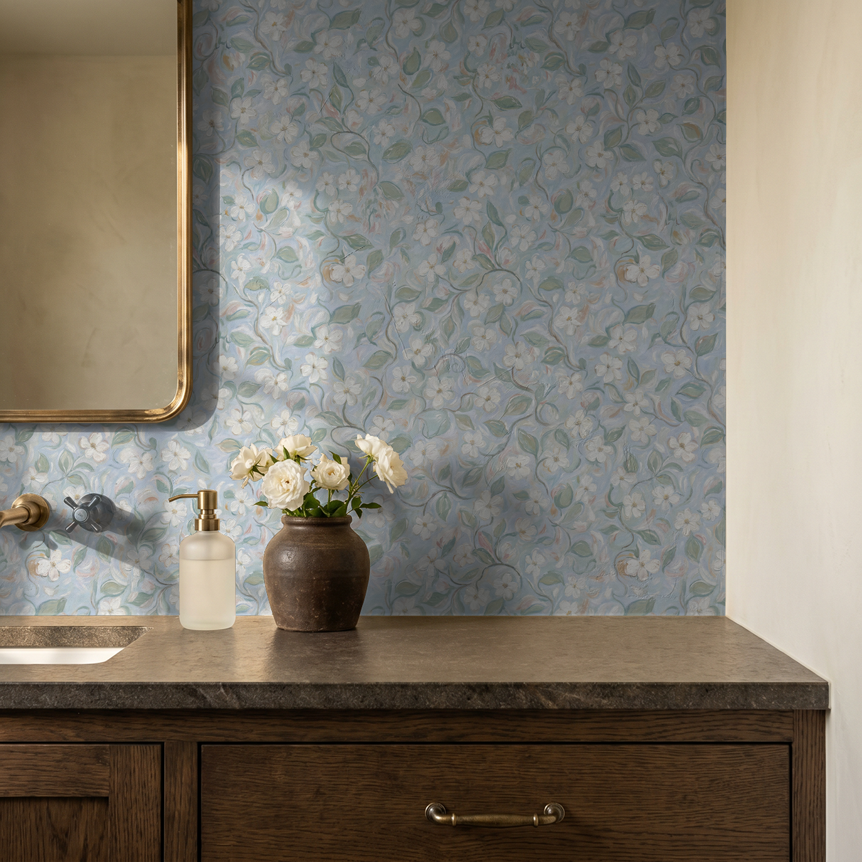 Blue floral wallpaper with white flowers in a vintage bathroom setting.