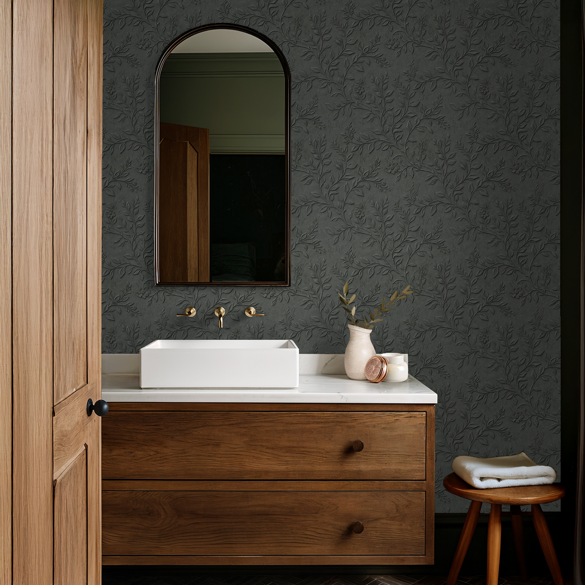 Elegant dark floral wallpaper in a modern bathroom with wood accents.