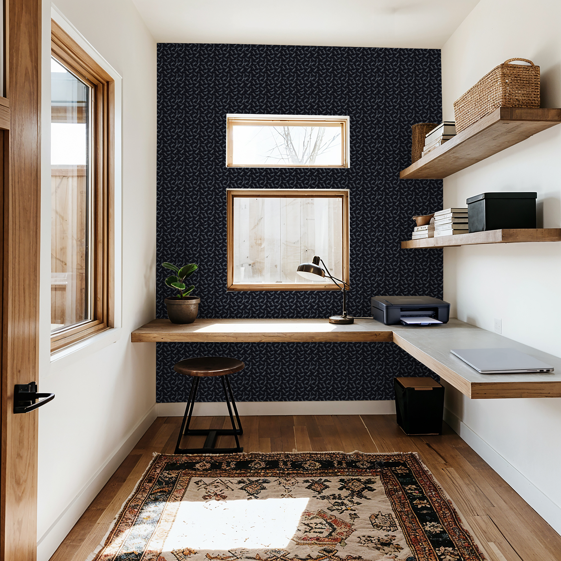 Dragonfly patterned wallpaper in black with wooden desk and shelves in modern office.