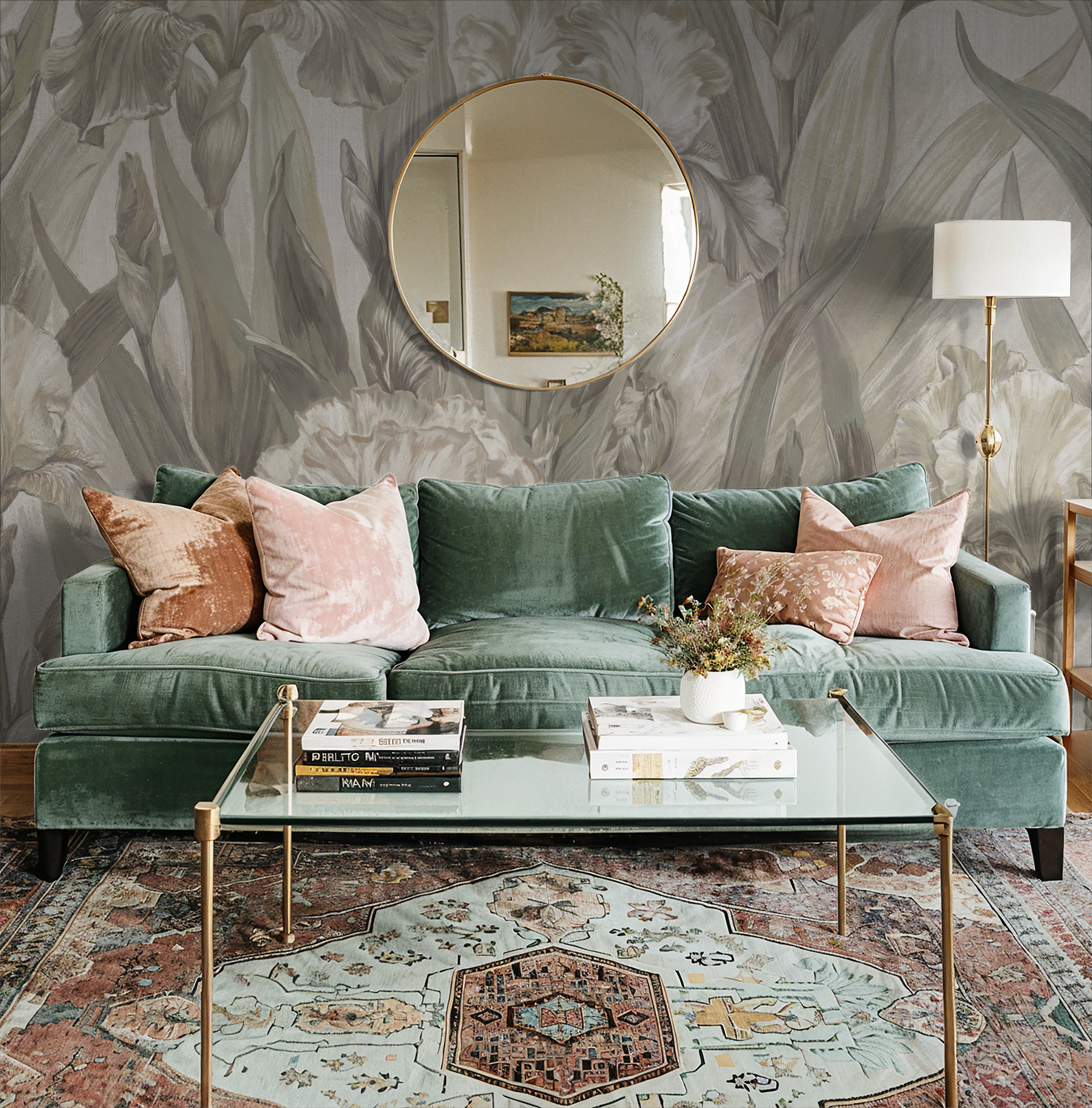 Elegant living room with floral iris wallpaper, green sofa, and glass coffee table.