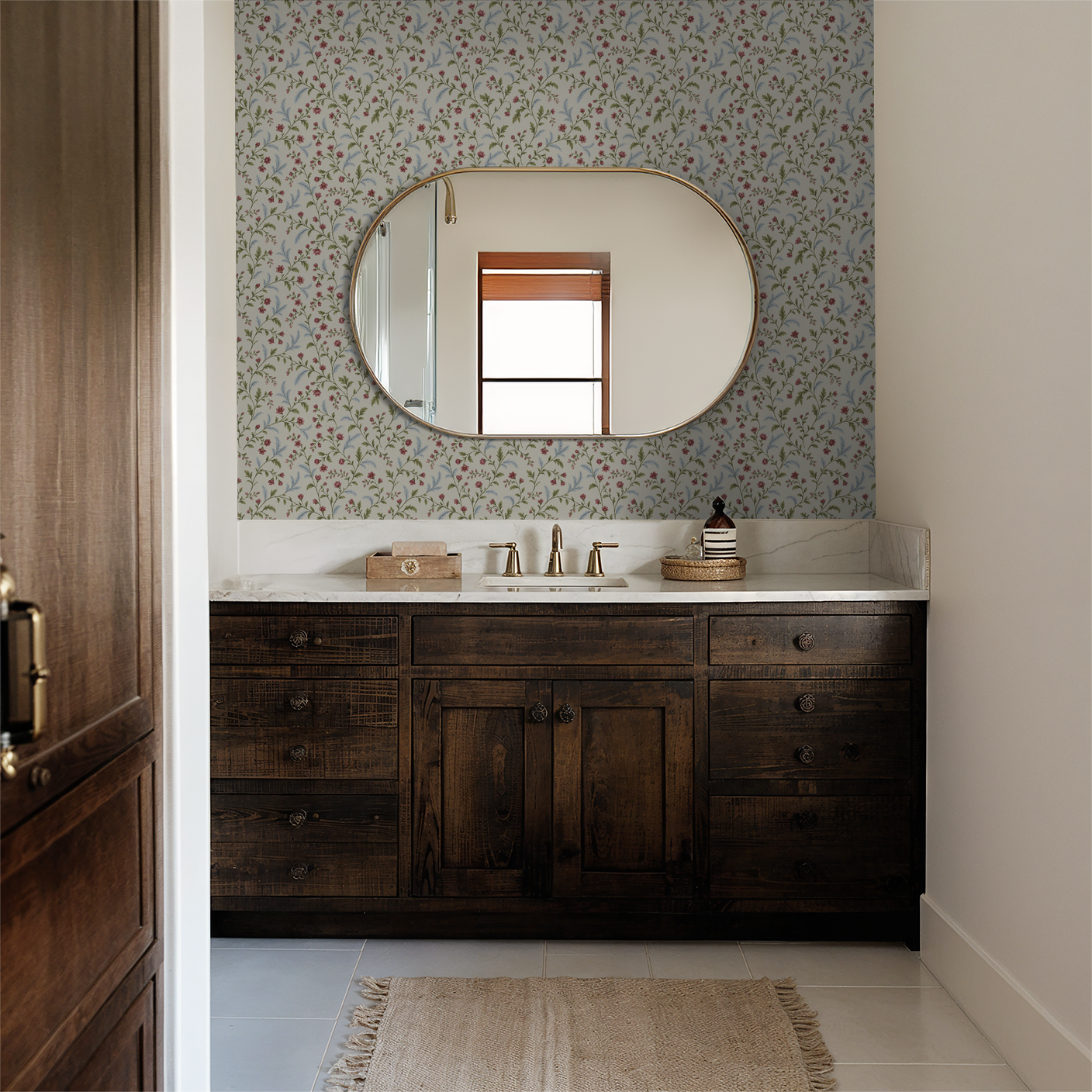 Floral wallpaper with pink blossoms and green leaves in a rustic bathroom setting.