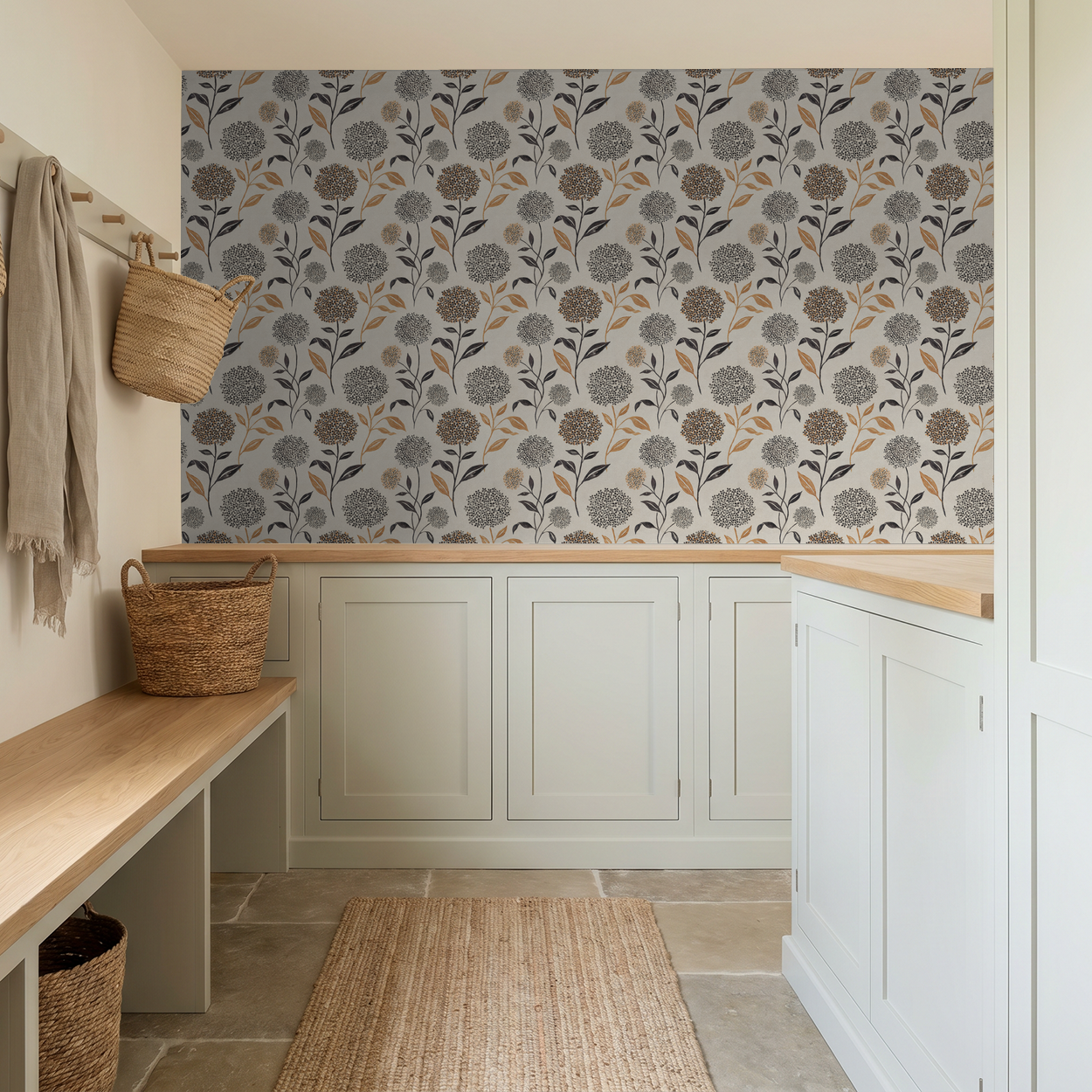 Floral wallpaper with terracotta and charcoal blooms in a rustic mudroom.