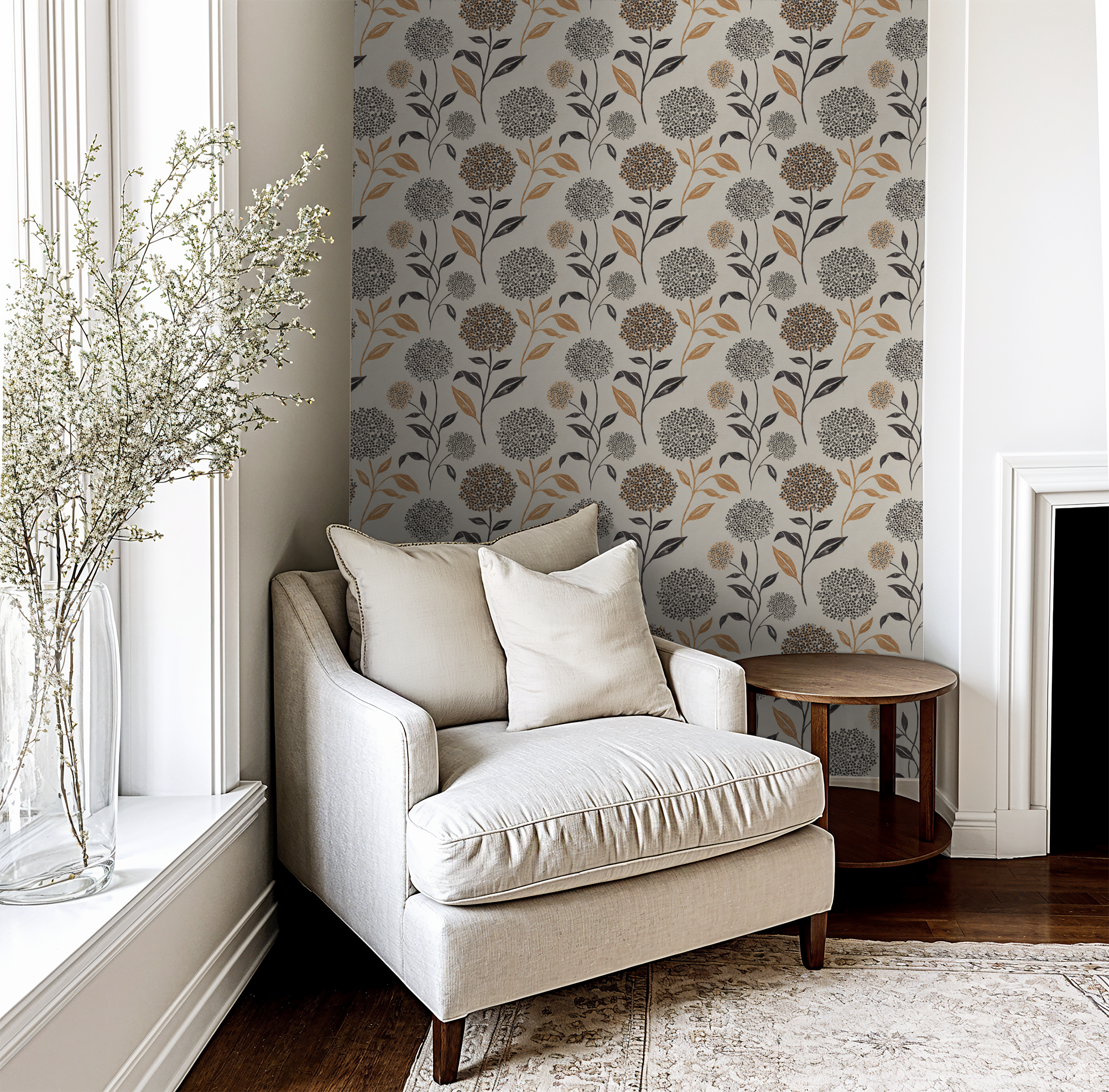 Floral wallpaper with terracotta and charcoal blooms in cozy living room setting.