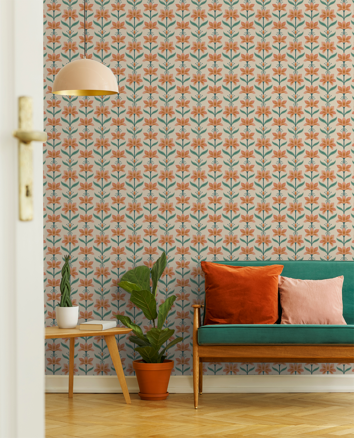Gardenza wallpaper with coral flowers and teal leaves in cozy living room setting.