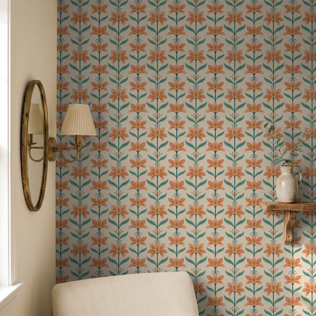Gardenza wallpaper with coral flowers on cream in cozy living room setting.