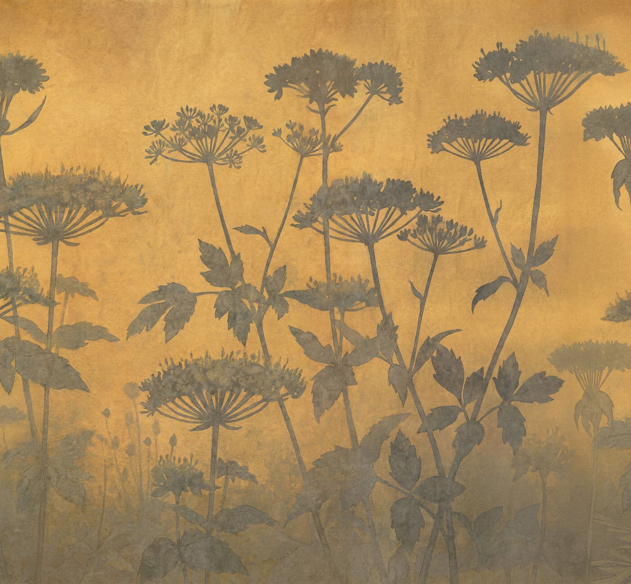Golden floral wallpaper with delicate silhouettes of flowers on a textured background.