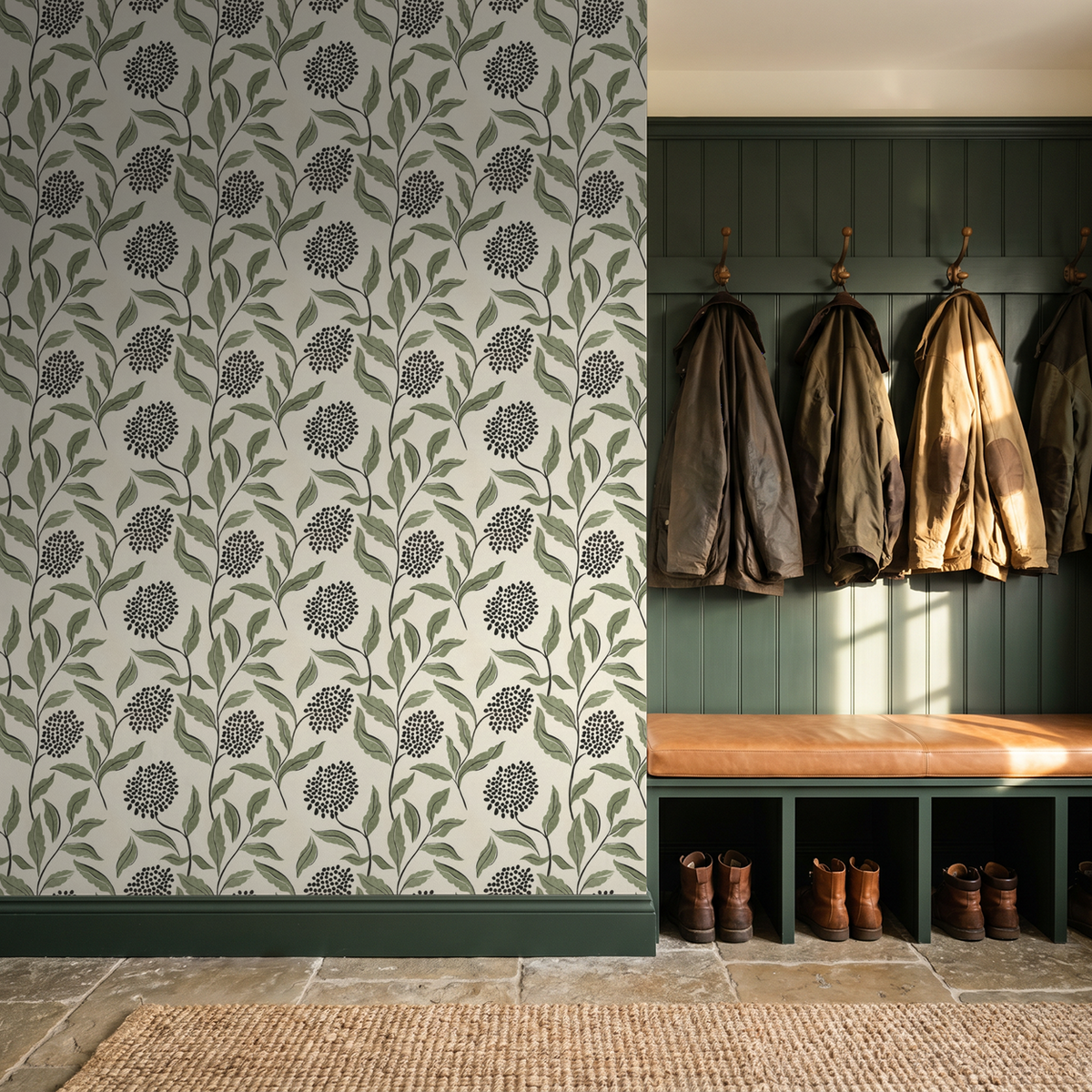 Green botanical wallpaper with sage leaves and charcoal dots in a rustic entryway.