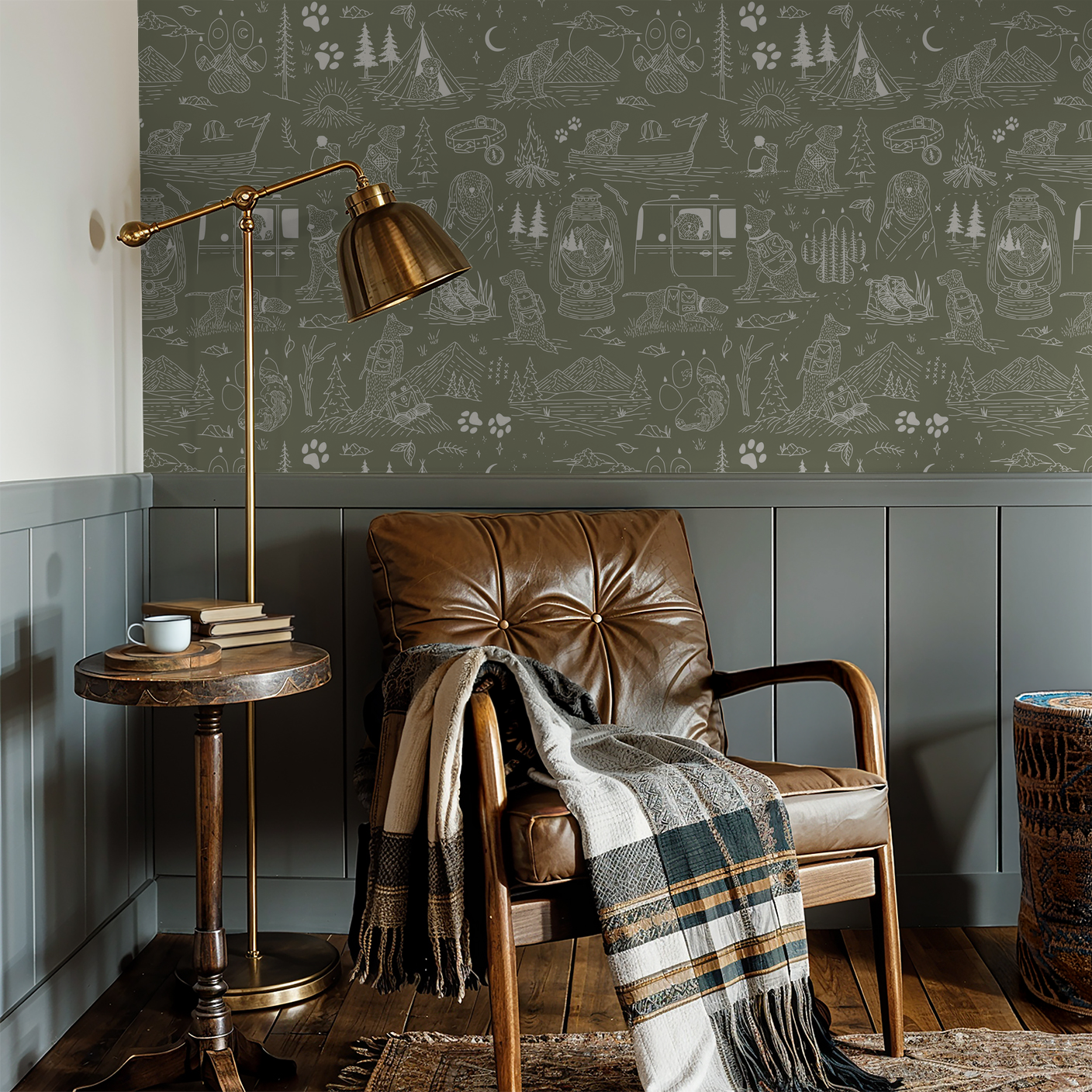 Green whimsical dog and camping wallpaper in cozy living room with leather chair and lamp.