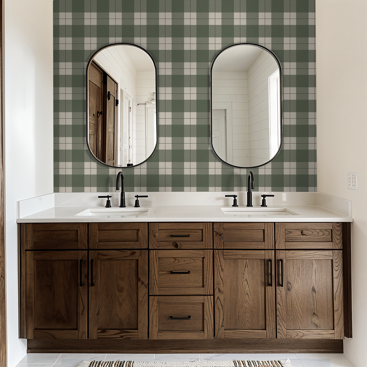 Green plaid wallpaper in modern bathroom with wooden vanity and mirrors.