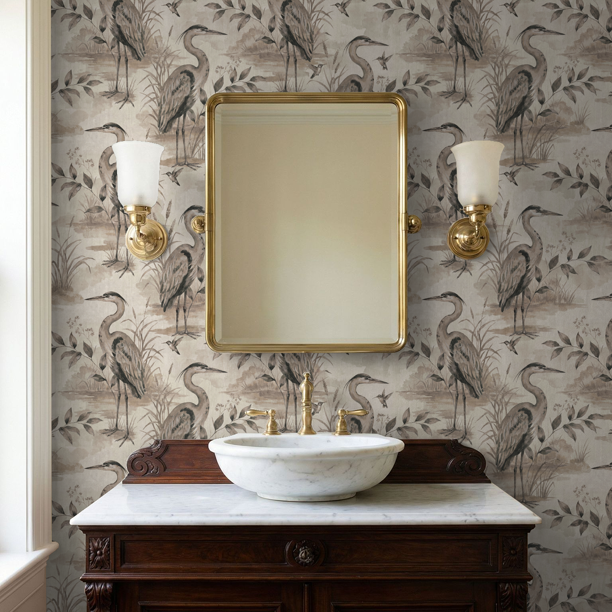 Heron Lake wallpaper with herons and foliage in taupe tones behind a vintage bathroom vanity.