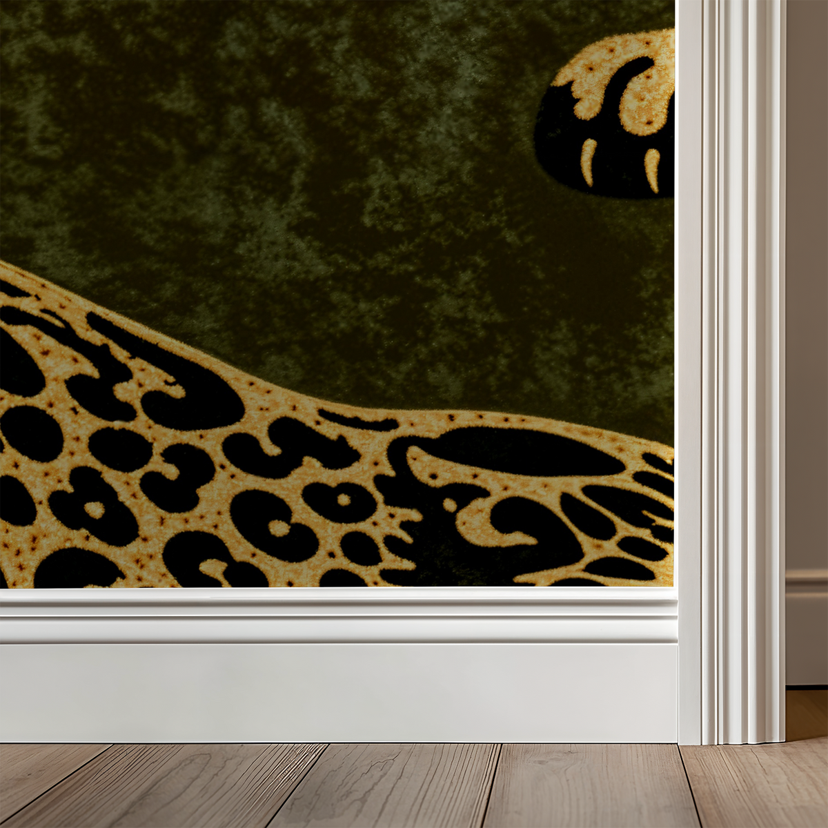 Leopard print wallpaper in gold and black on earthy green background, close-up view.
