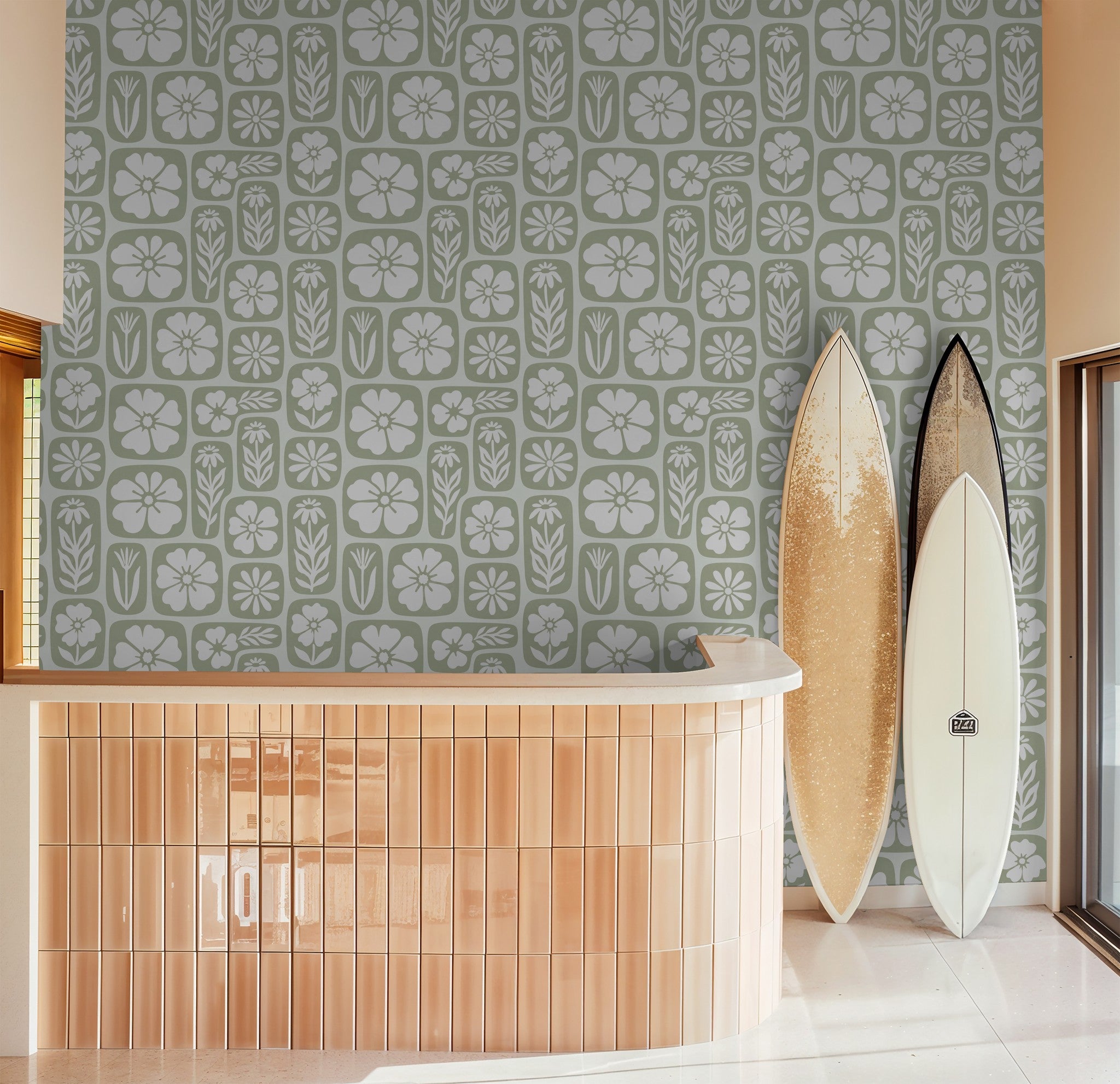 Pale sage floral wallpaper with white motifs in a modern room with surfboards.