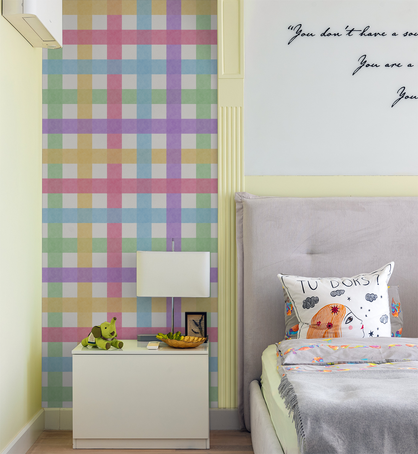Pastel gingham wallpaper in pink, blue, green, yellow, and purple in a cozy bedroom setting.