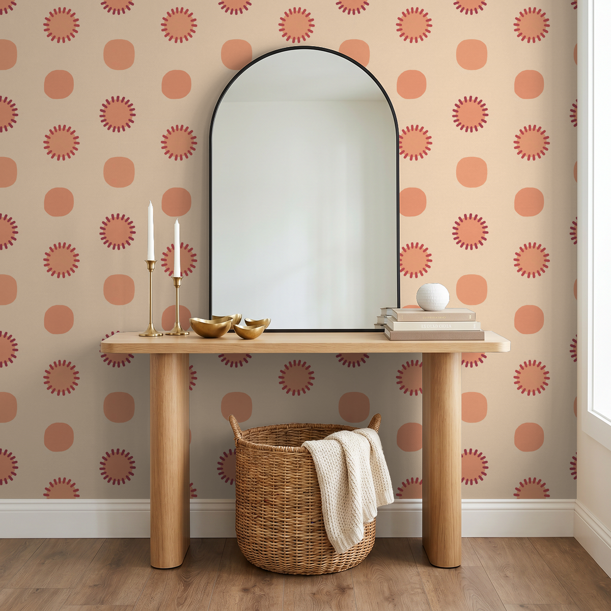Peach geometric circle wallpaper in modern room with mirror and wooden console.