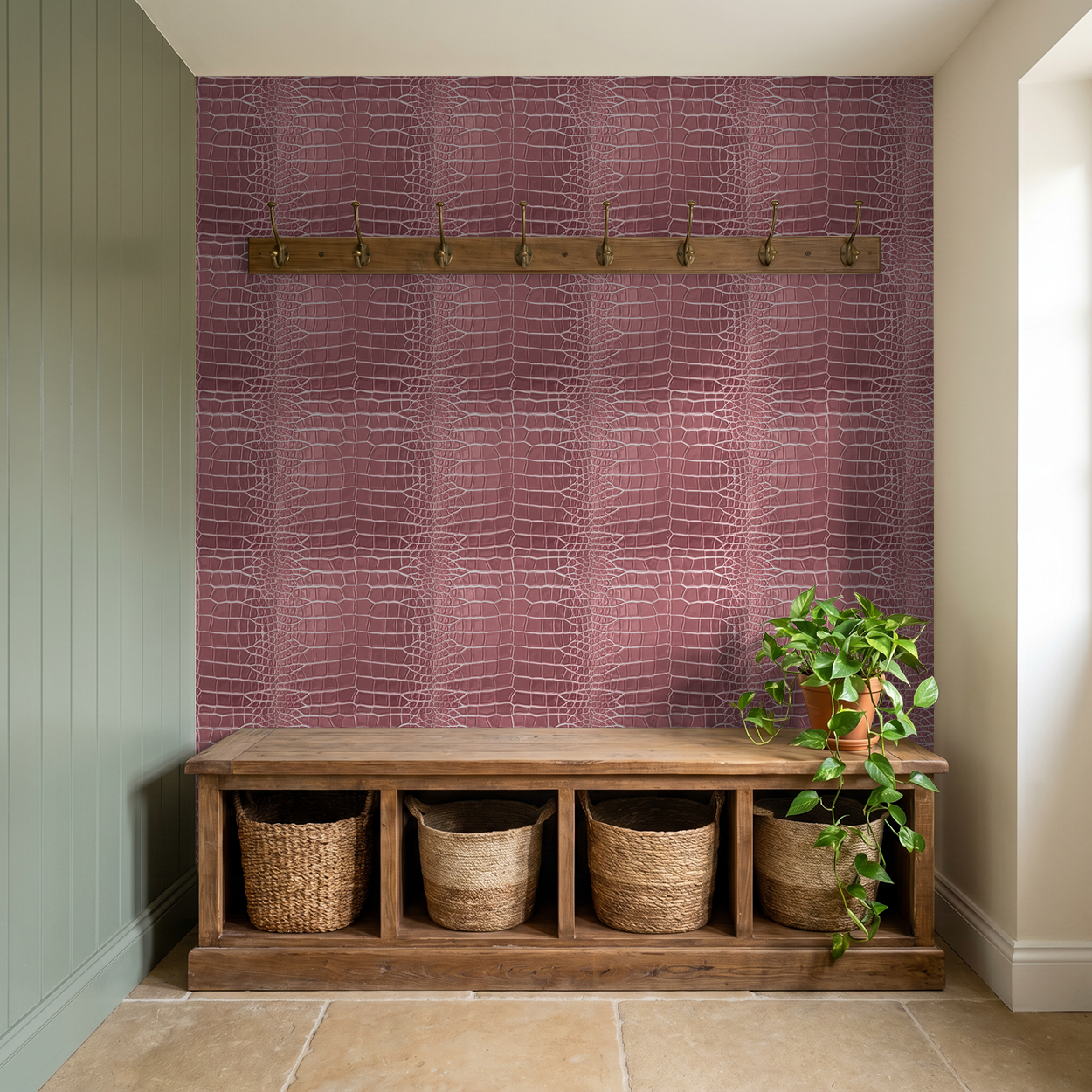 Pink crocodile texture wallpaper in a modern entryway with baskets and plants.