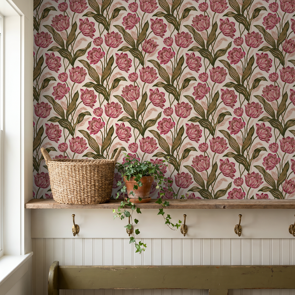 Floral wallpaper with pink tulips and green leaves in rustic room setting.