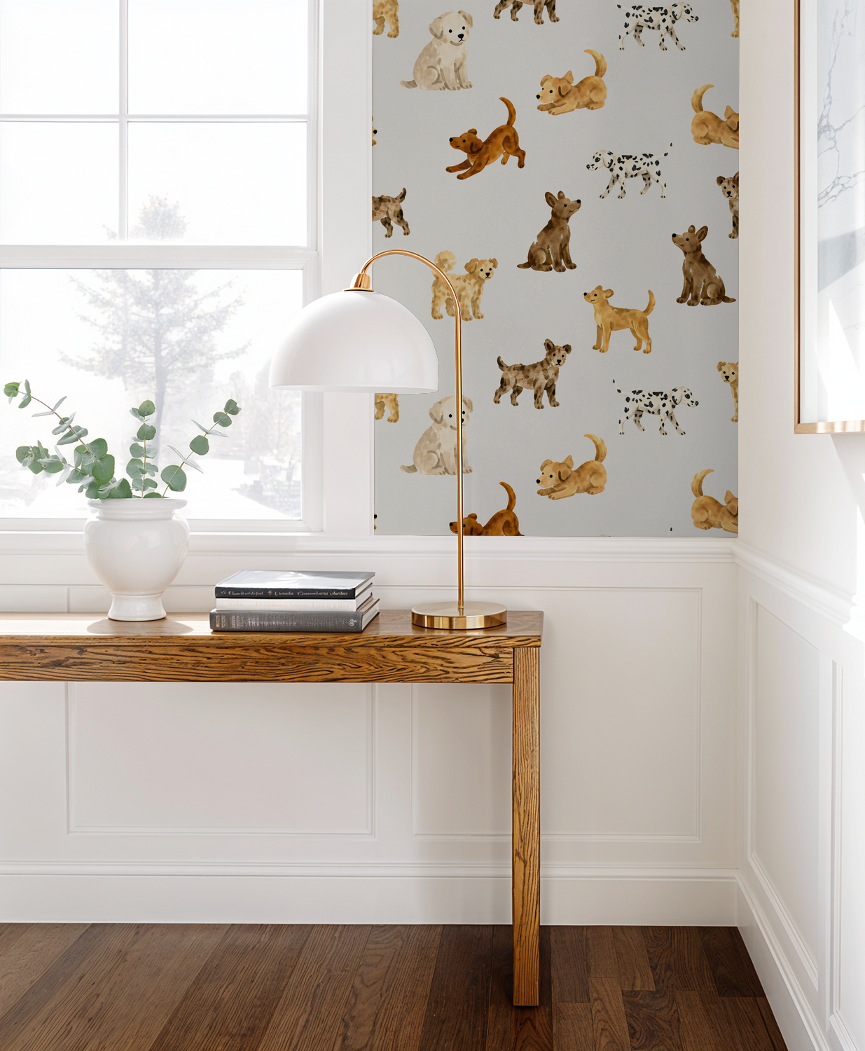 Playful dog wallpaper in light-filled room with wooden table and lamp.