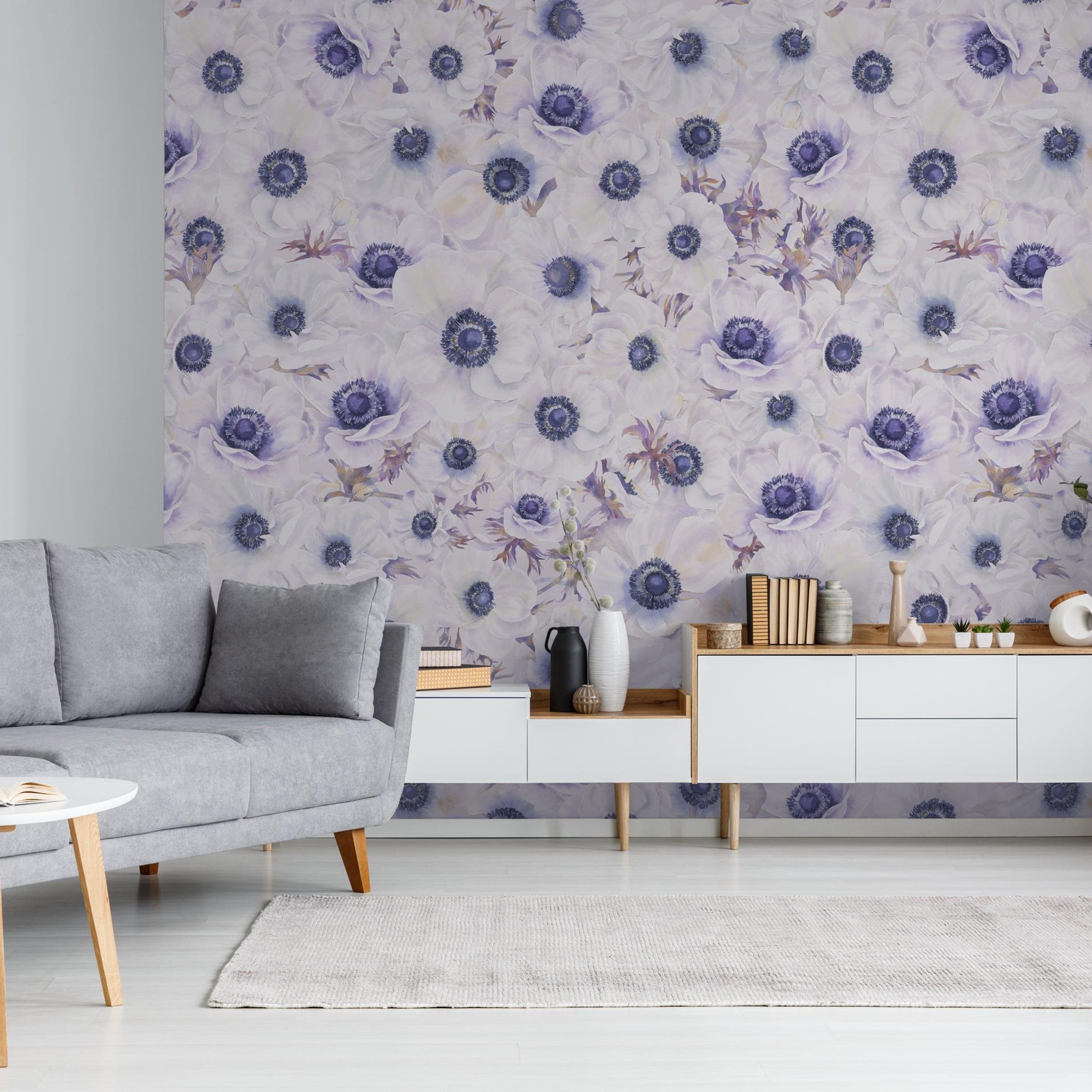 Contemporary living room with Fleur Blanche Wallpaper from The Nida Jahain Line, elegant floral design focus.