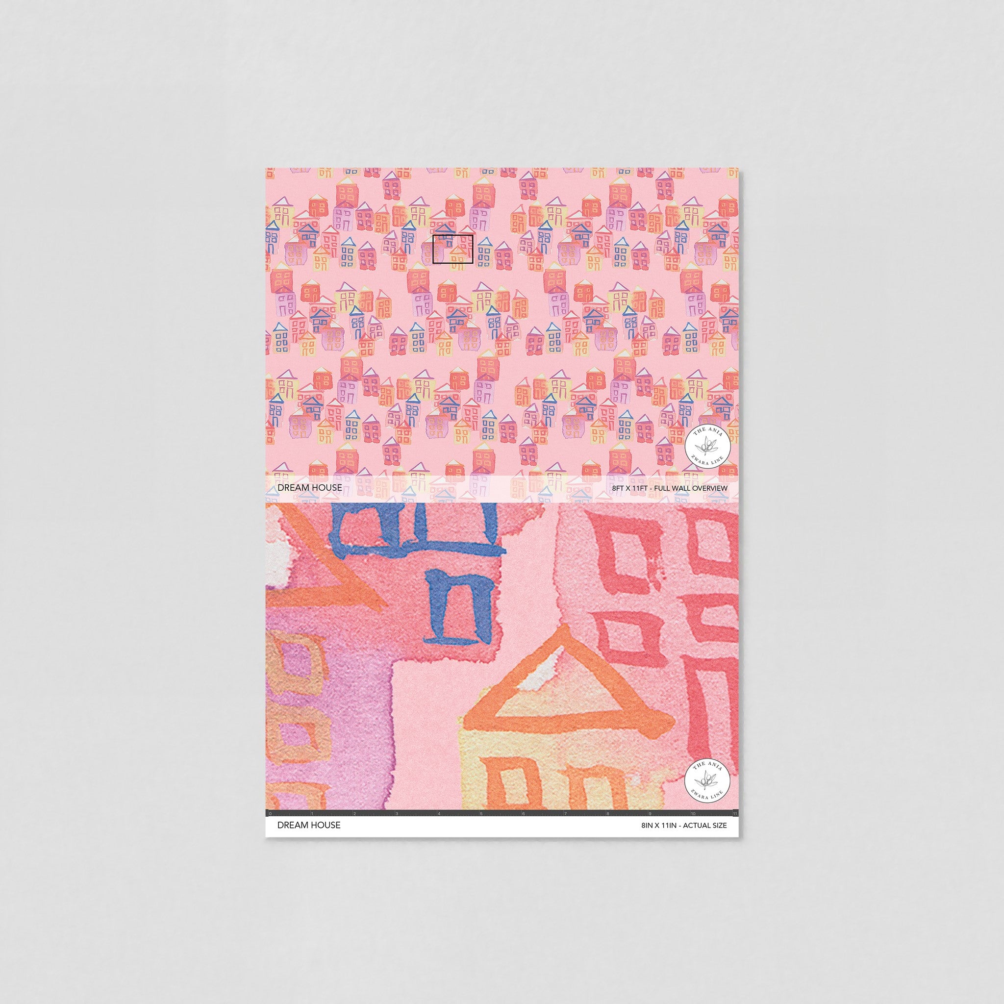 "Wall Blush Dream House Wallpaper sample with pink and playful house patterns for a nursery room."