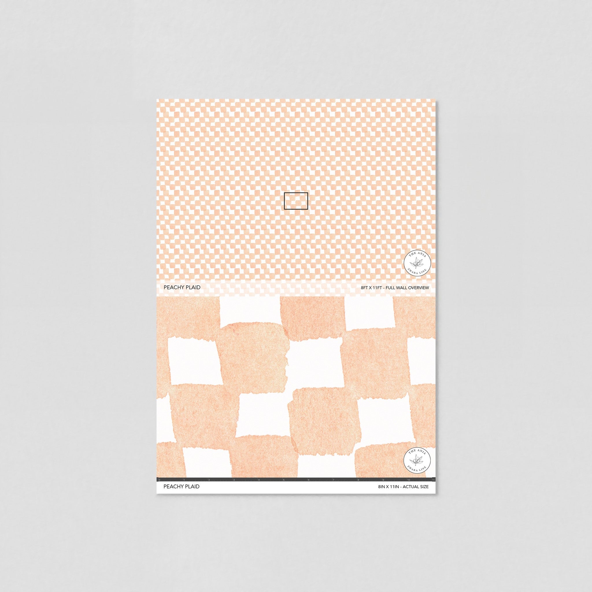 Wall Blush's Peachy Plaid Wallpaper showcased in a neutral setting, highlighting the pattern's detail.