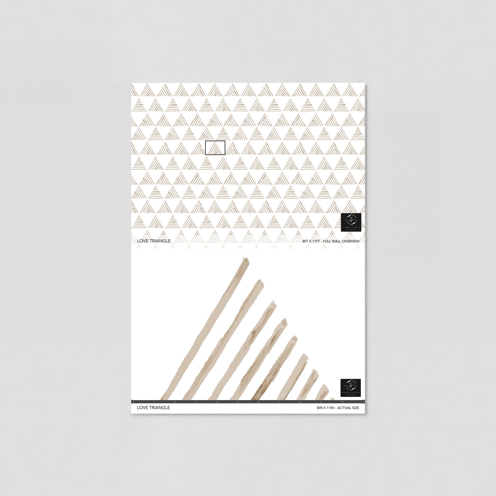 "Wall Blush Love Triangle Wallpaper samples in modern office space, showcasing geometric design focus."