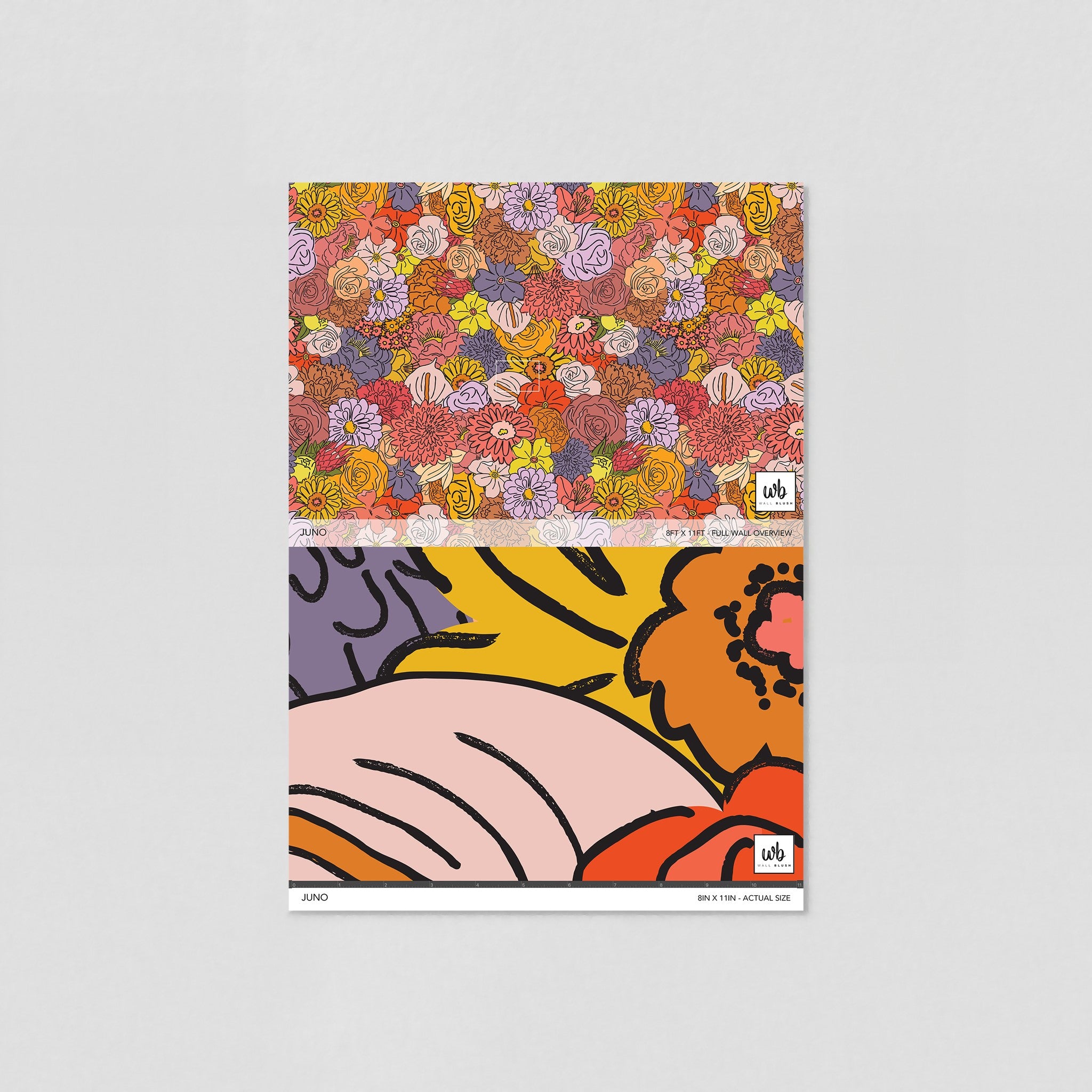 "Wall Blush's Juno Wallpaper vibrant floral design showcased in a minimalist styled living room, focusing on wall decor."